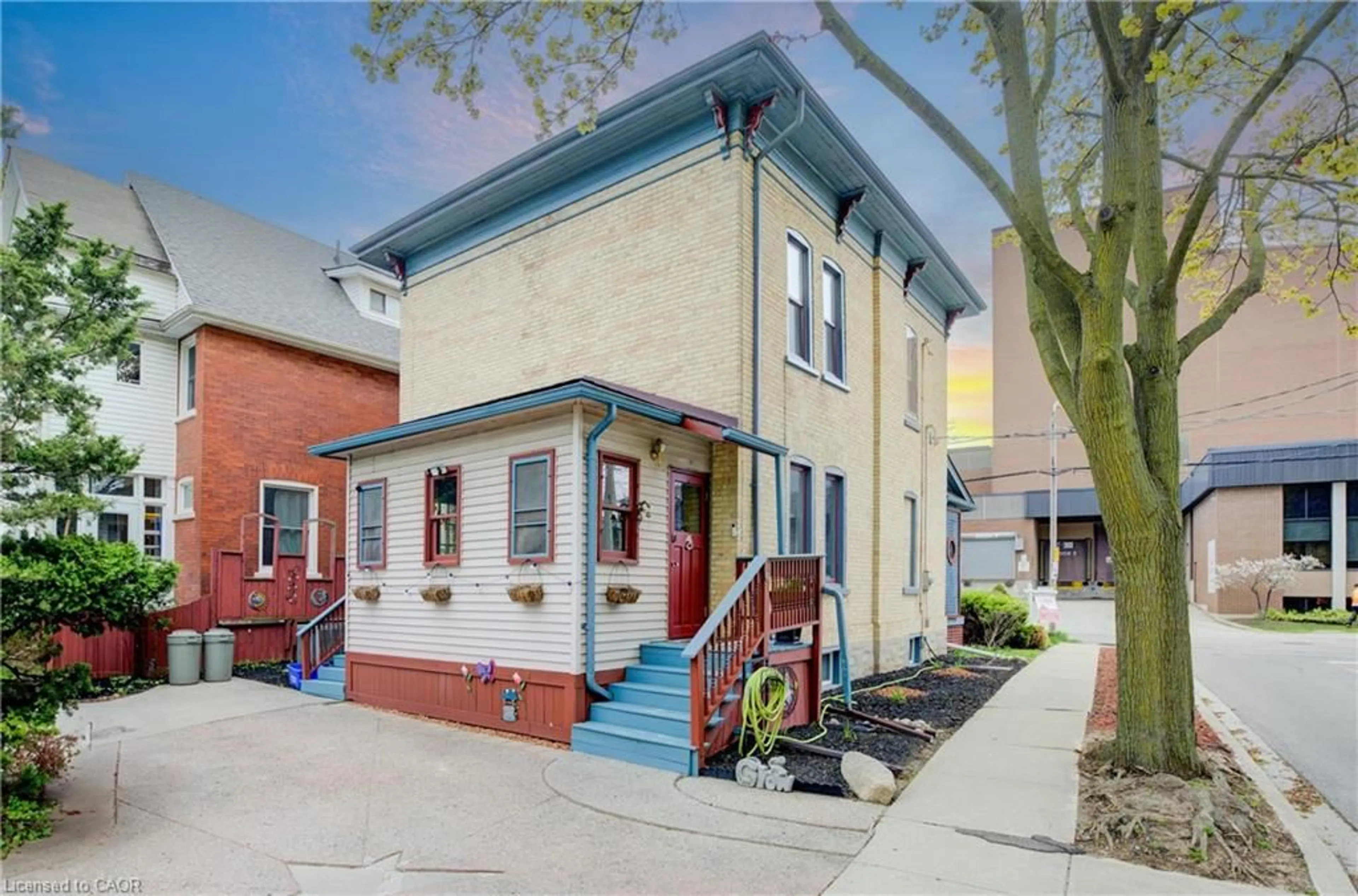 Home with brick exterior material, street for 32 Ellen St, Kitchener Ontario N2H 1L4
