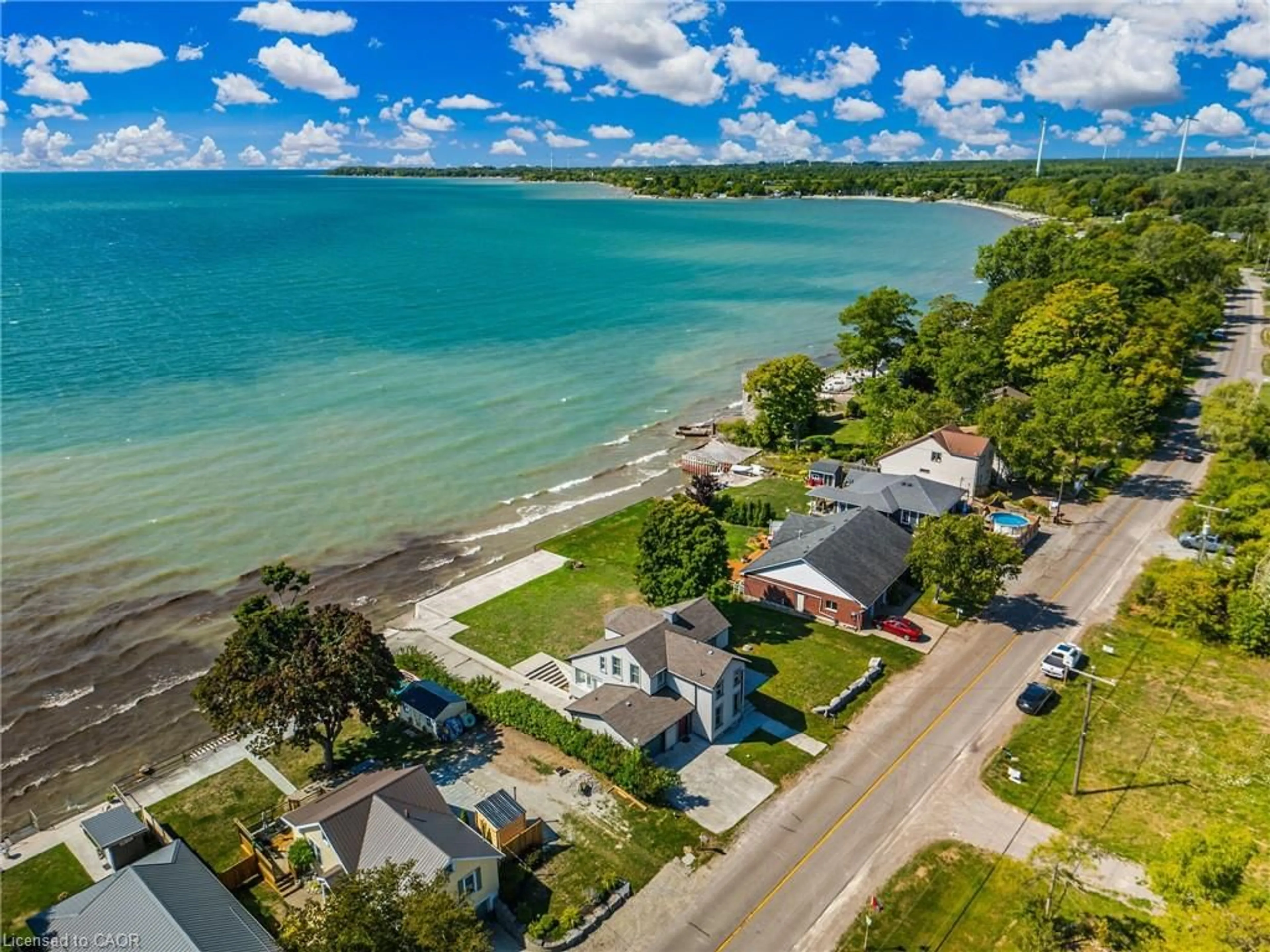 A pic from outside/outdoor area/front of a property/back of a property/a pic from drone, water/lake/river/ocean view for 2952 Northshore Dr, Lowbanks Ontario N0A 1K0