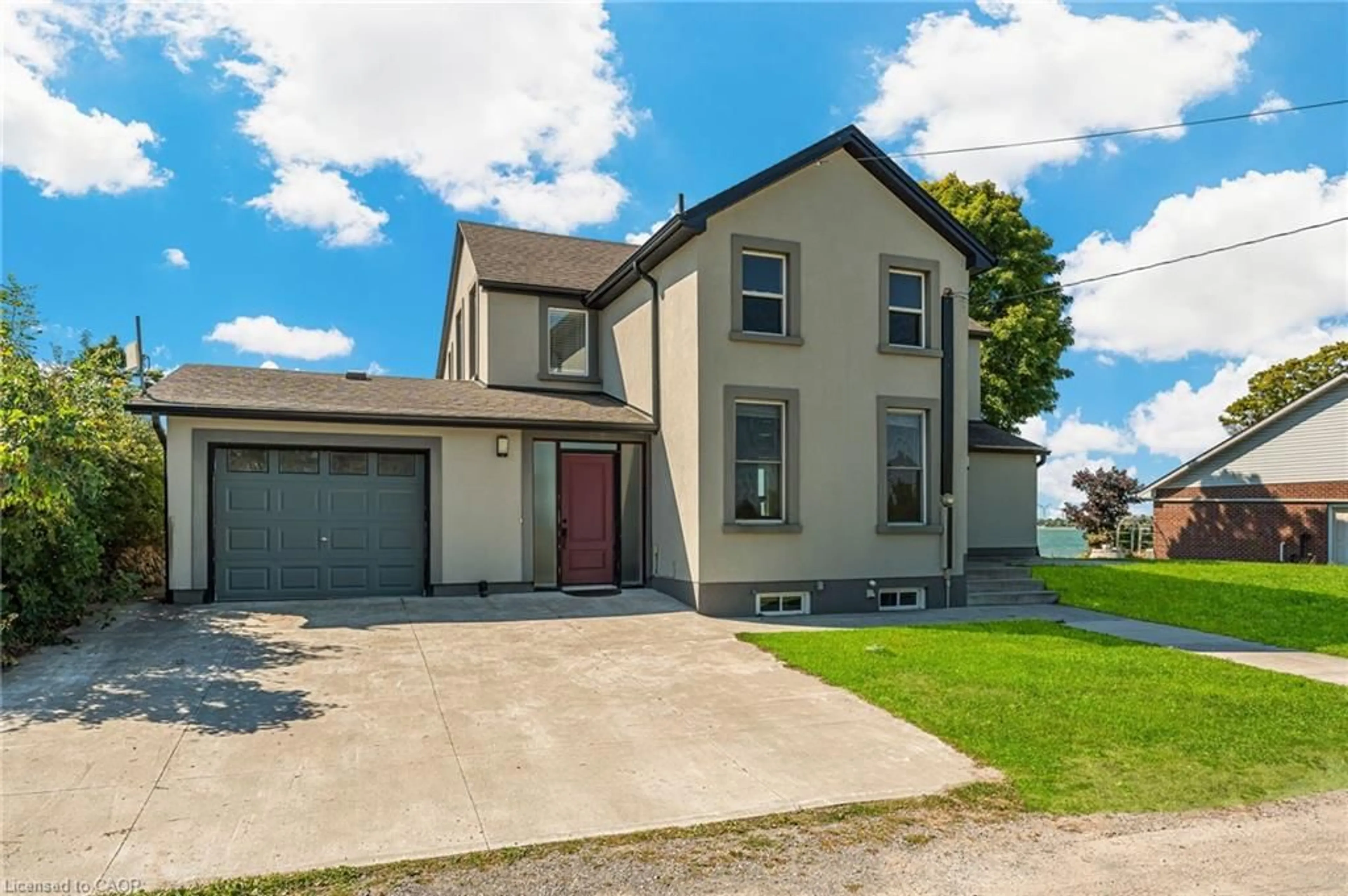 A pic from outside/outdoor area/front of a property/back of a property/a pic from drone, street for 2952 Northshore Dr, Lowbanks Ontario N0A 1K0