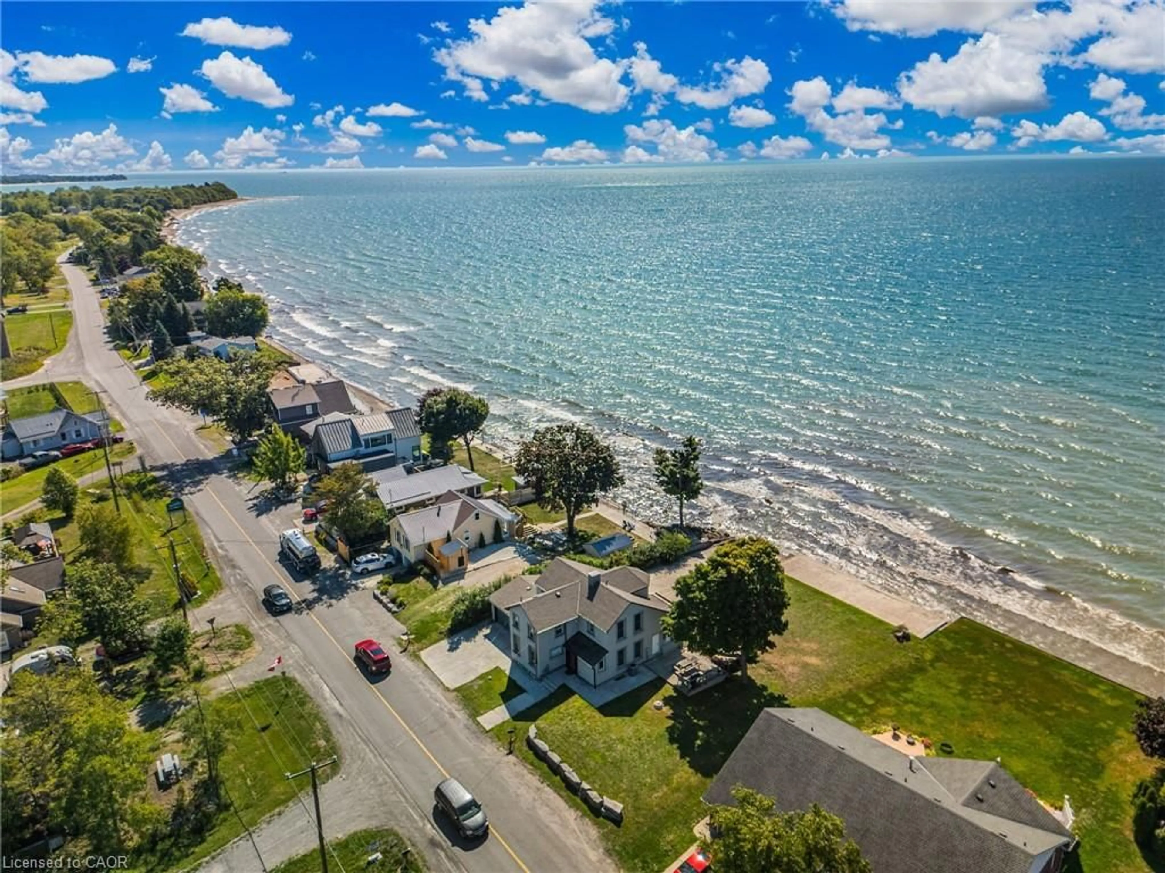 A pic from outside/outdoor area/front of a property/back of a property/a pic from drone, water/lake/river/ocean view for 2952 Northshore Dr, Lowbanks Ontario N0A 1K0