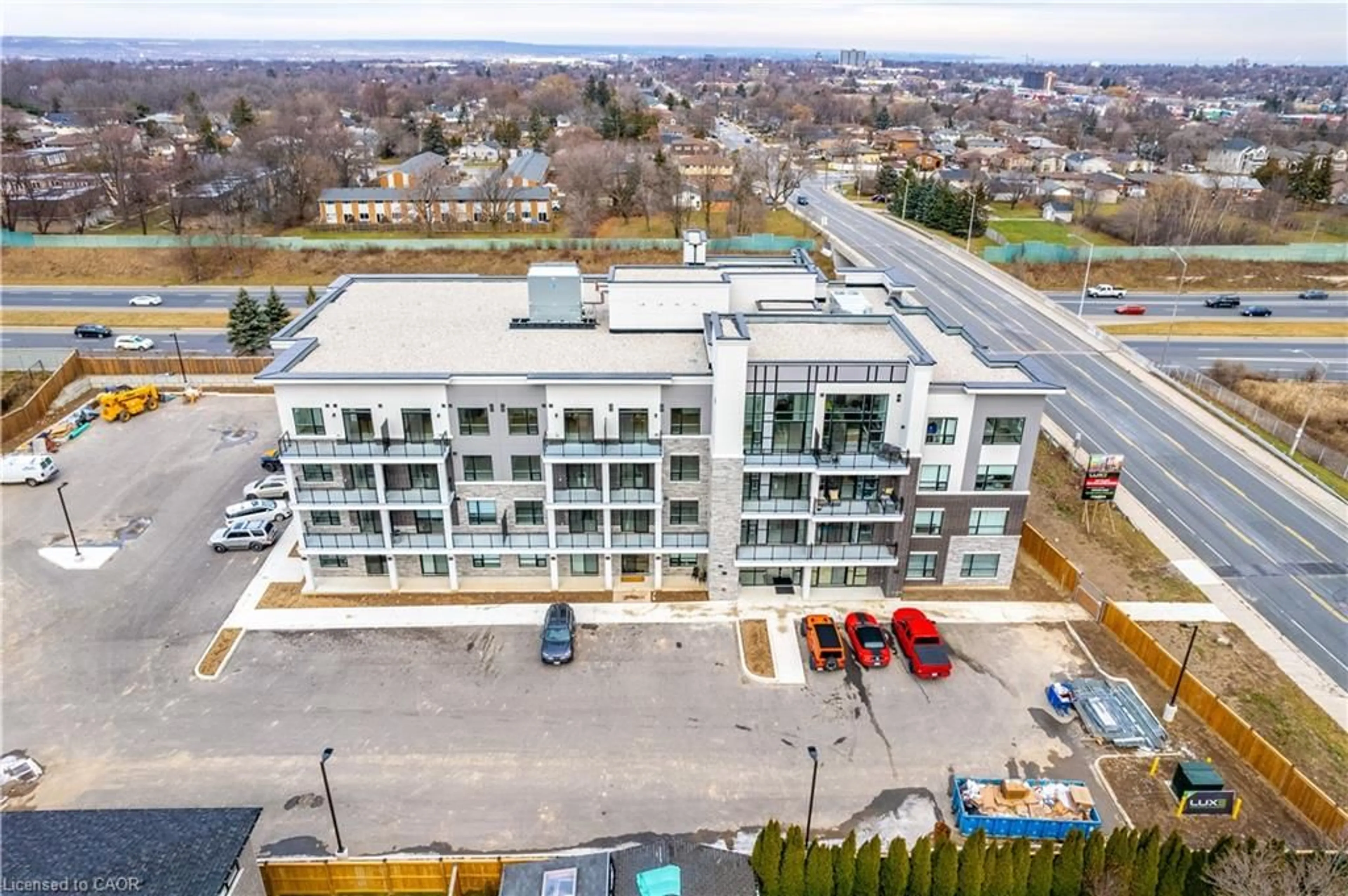 A pic from outside/outdoor area/front of a property/back of a property/a pic from drone, building for 120 Springvalley Cres #302, Hamilton Ontario L9C 0E4