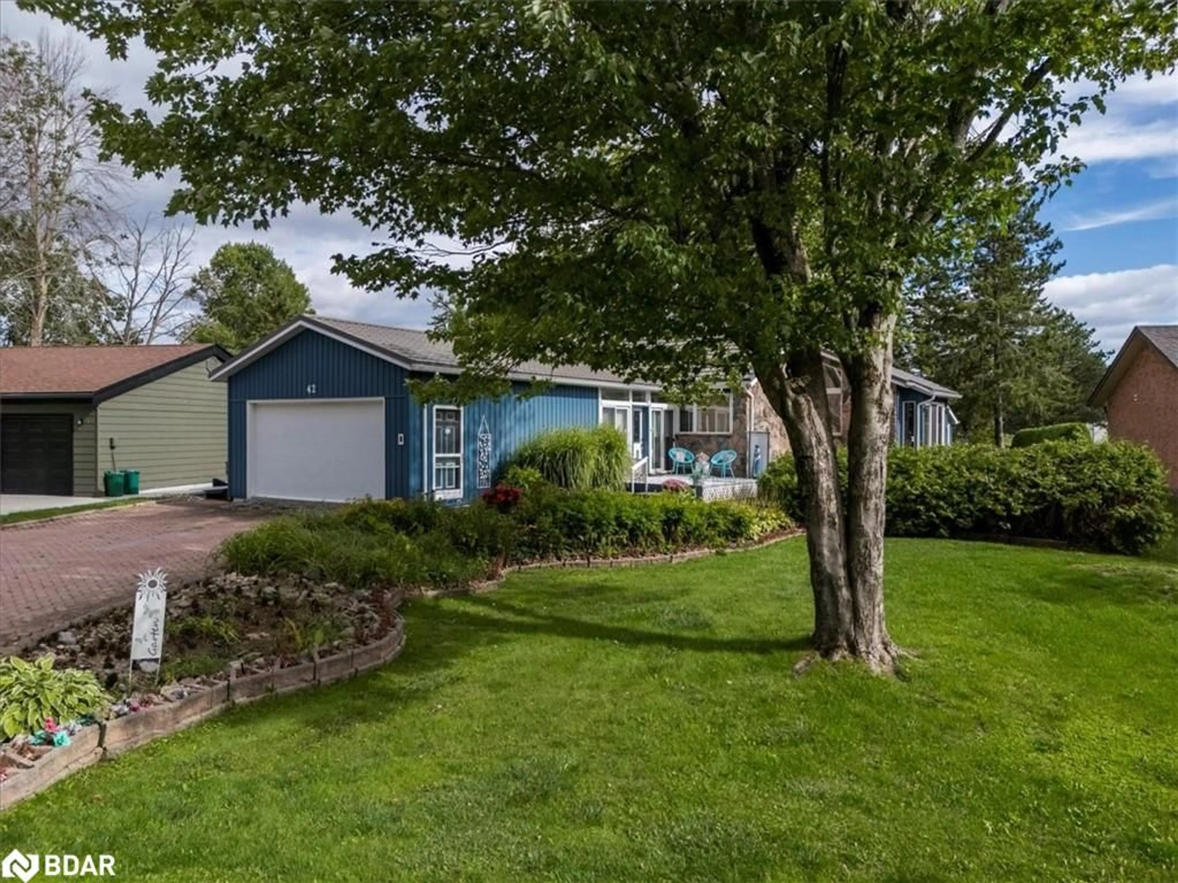 Home with vinyl exterior material, street for 42 Old Indian Trail, Brechin Ontario L0K 1B0