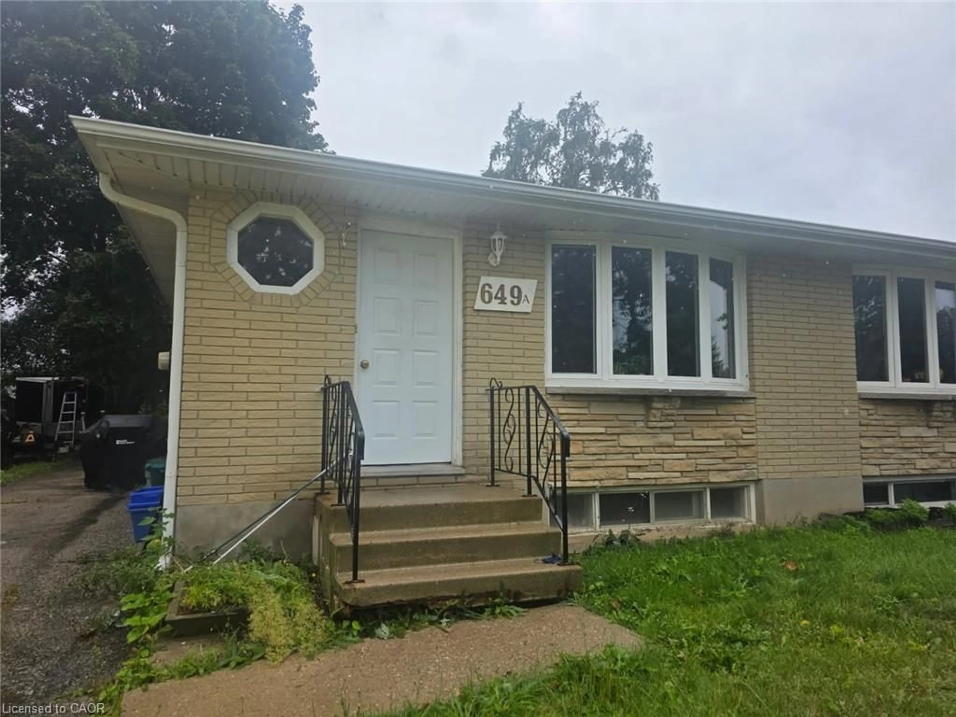 Home with vinyl exterior material, street for 649 Silverbirch Rd #A, Waterloo Ontario N2L 4R4