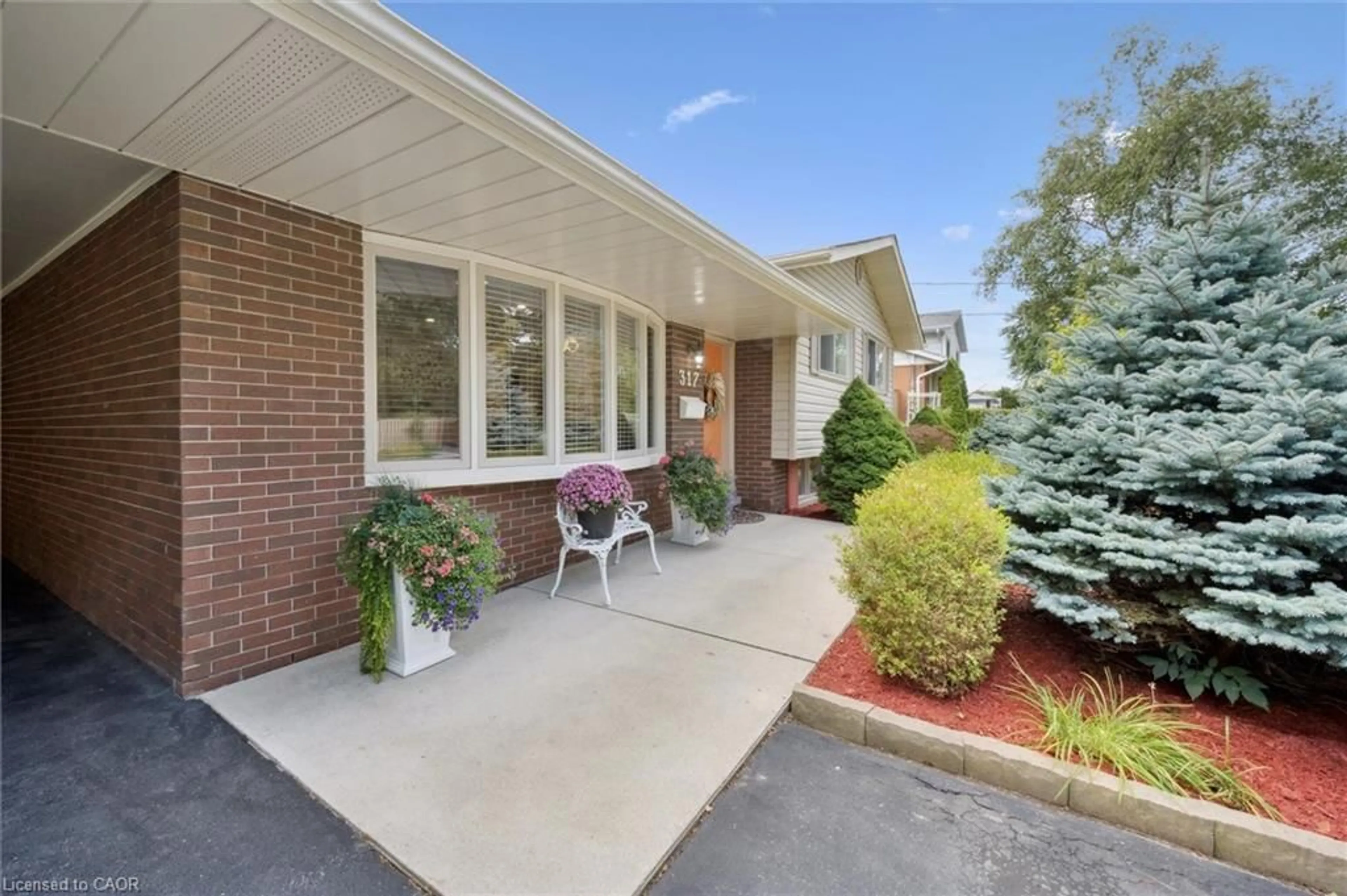 Home with brick exterior material, street for 317 Greenbrook Dr, Kitchener Ontario N2M 4K1