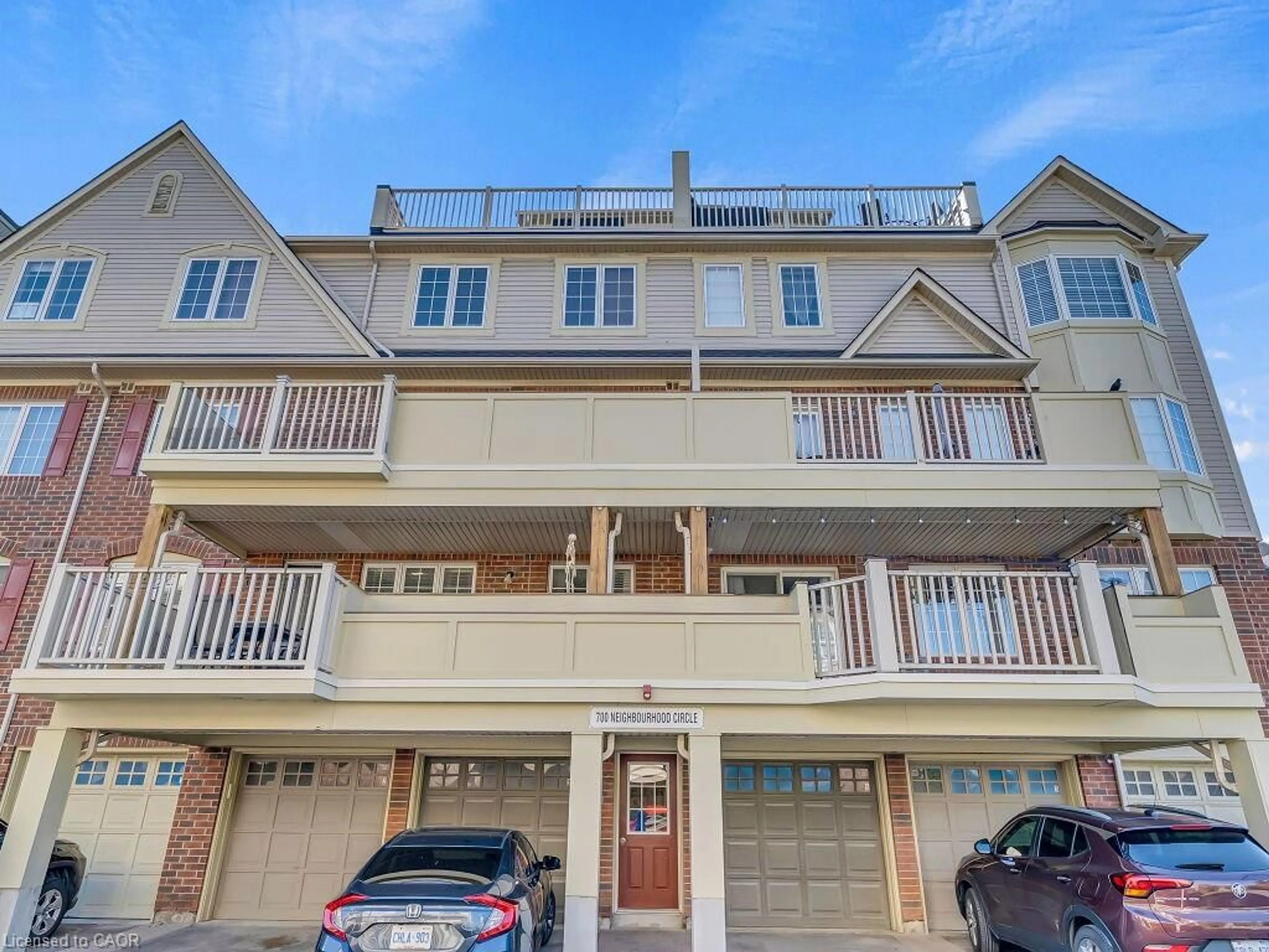 A pic from outside/outdoor area/front of a property/back of a property/a pic from drone, street for 700 Neighbourhood Cir #1, Mississauga Ontario L5B 0A6