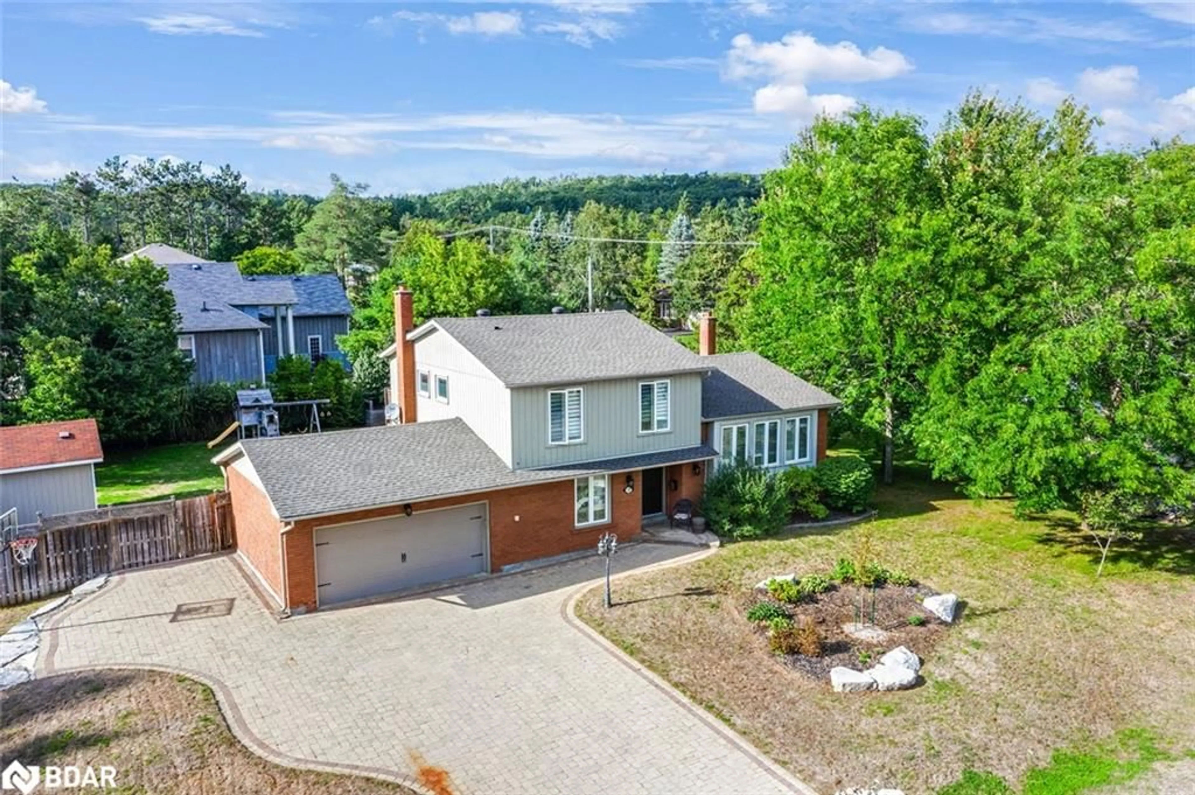 A pic from outside/outdoor area/front of a property/back of a property/a pic from drone, unknown for 30 Cedar Creek Rd, Midhurst Ontario L9X 0P5