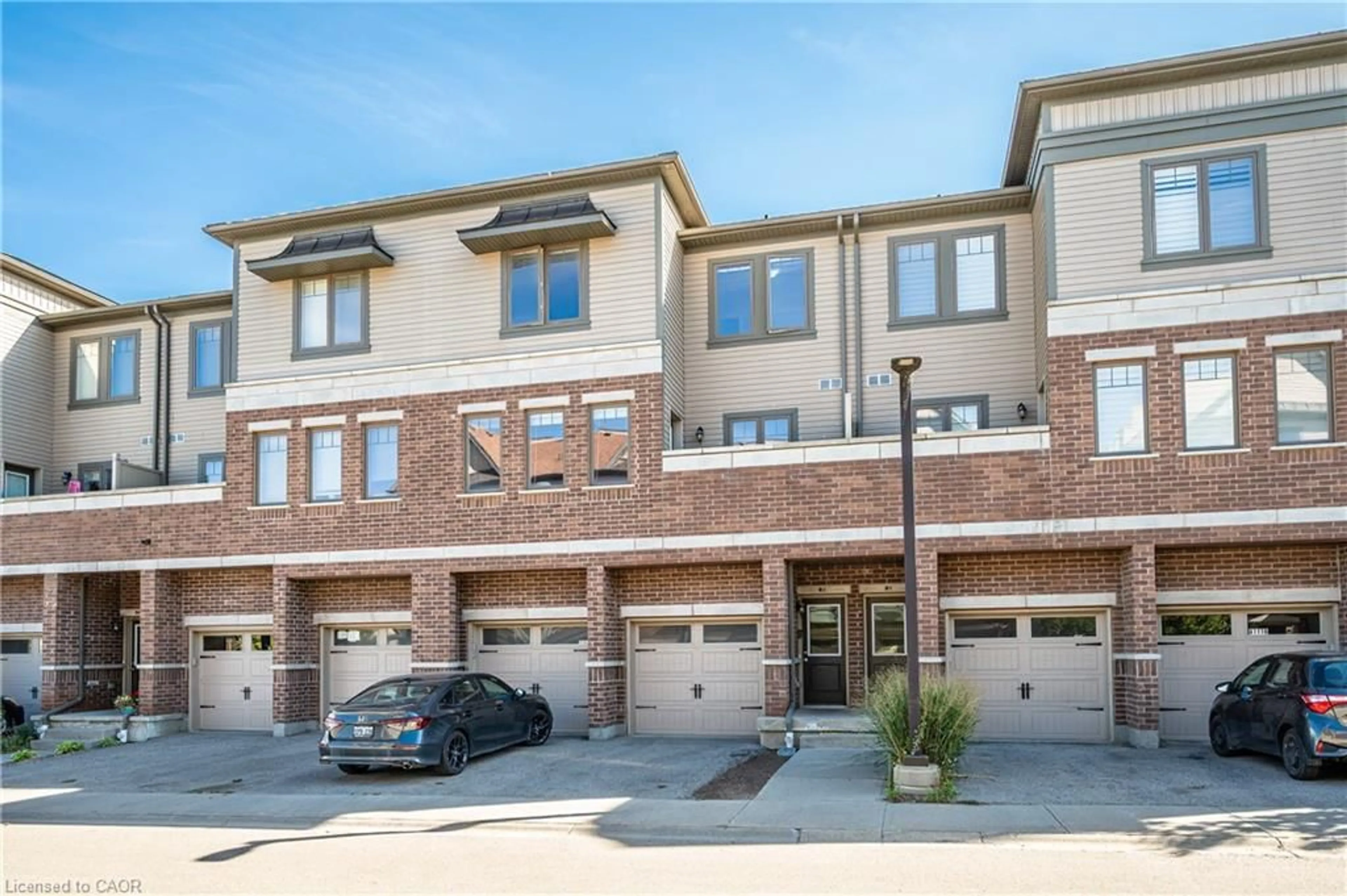 Home with brick exterior material, street for 70 Willowrun Dr #B2, Kitchener Ontario N2A 0H5