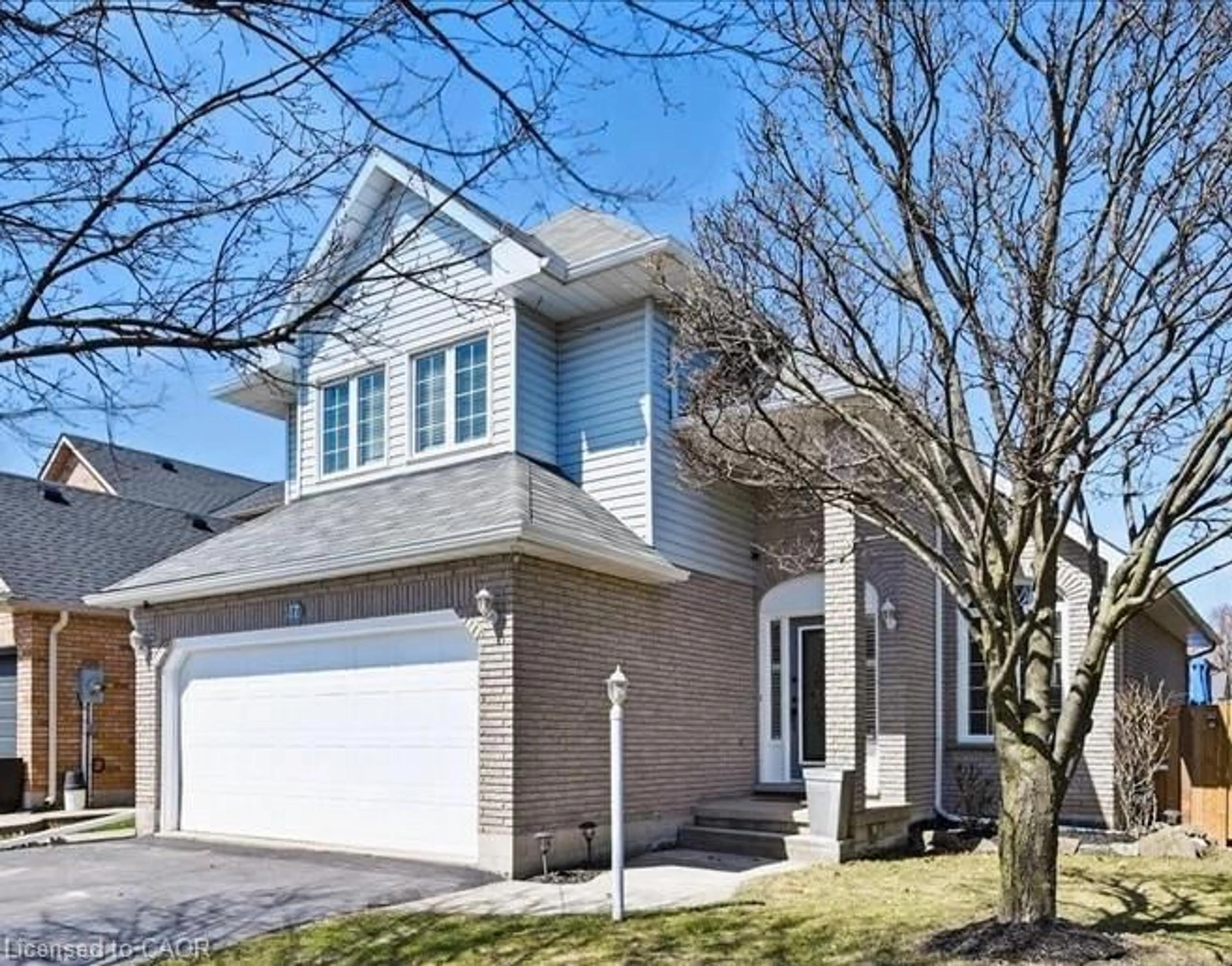 Home with brick exterior material, street for 17 Rockhaven Lane, Waterdown Ontario L8B 0H7