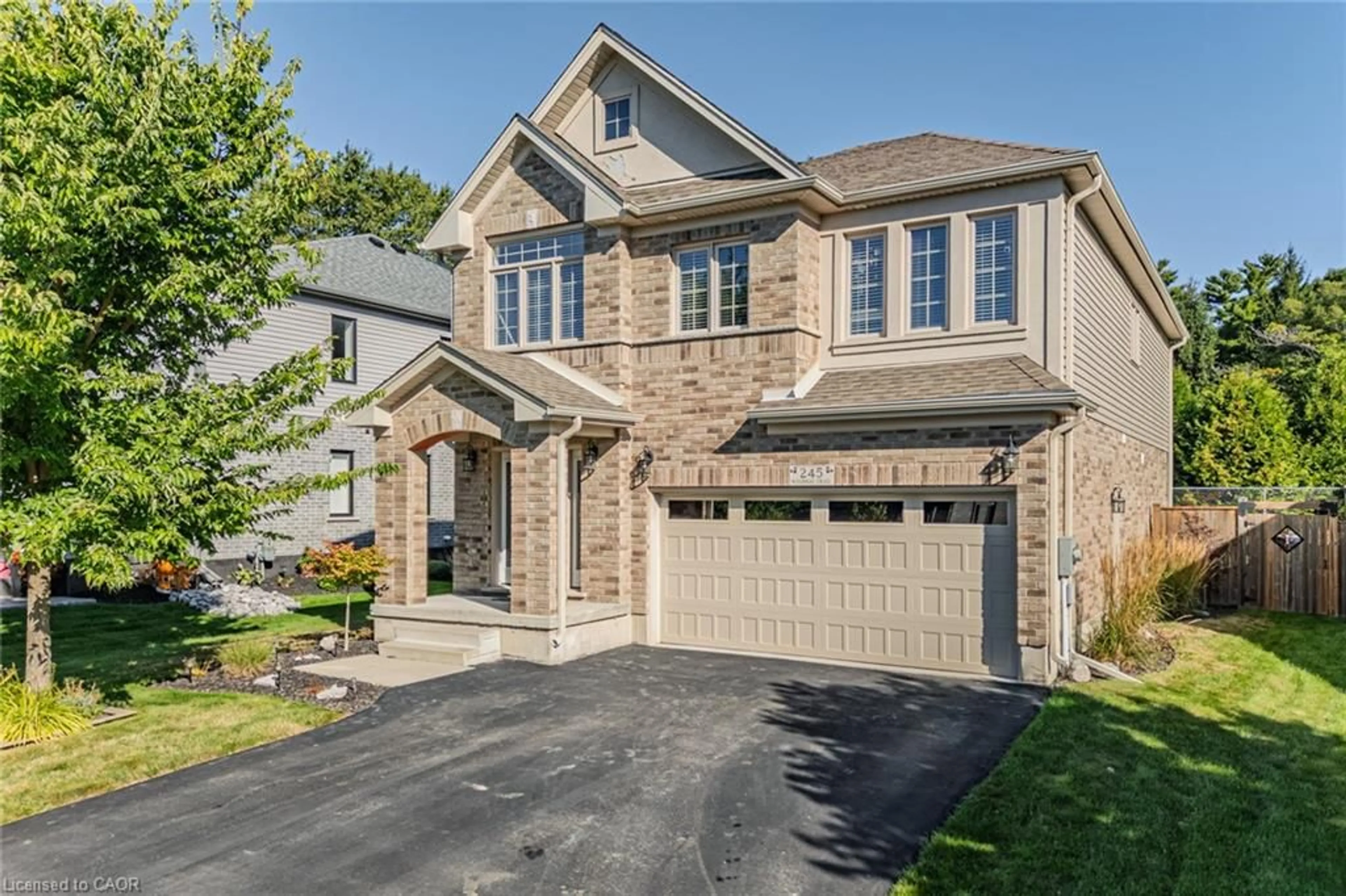Home with brick exterior material, street for 245 Woodway Trail, Simcoe Ontario N3Y 0E1