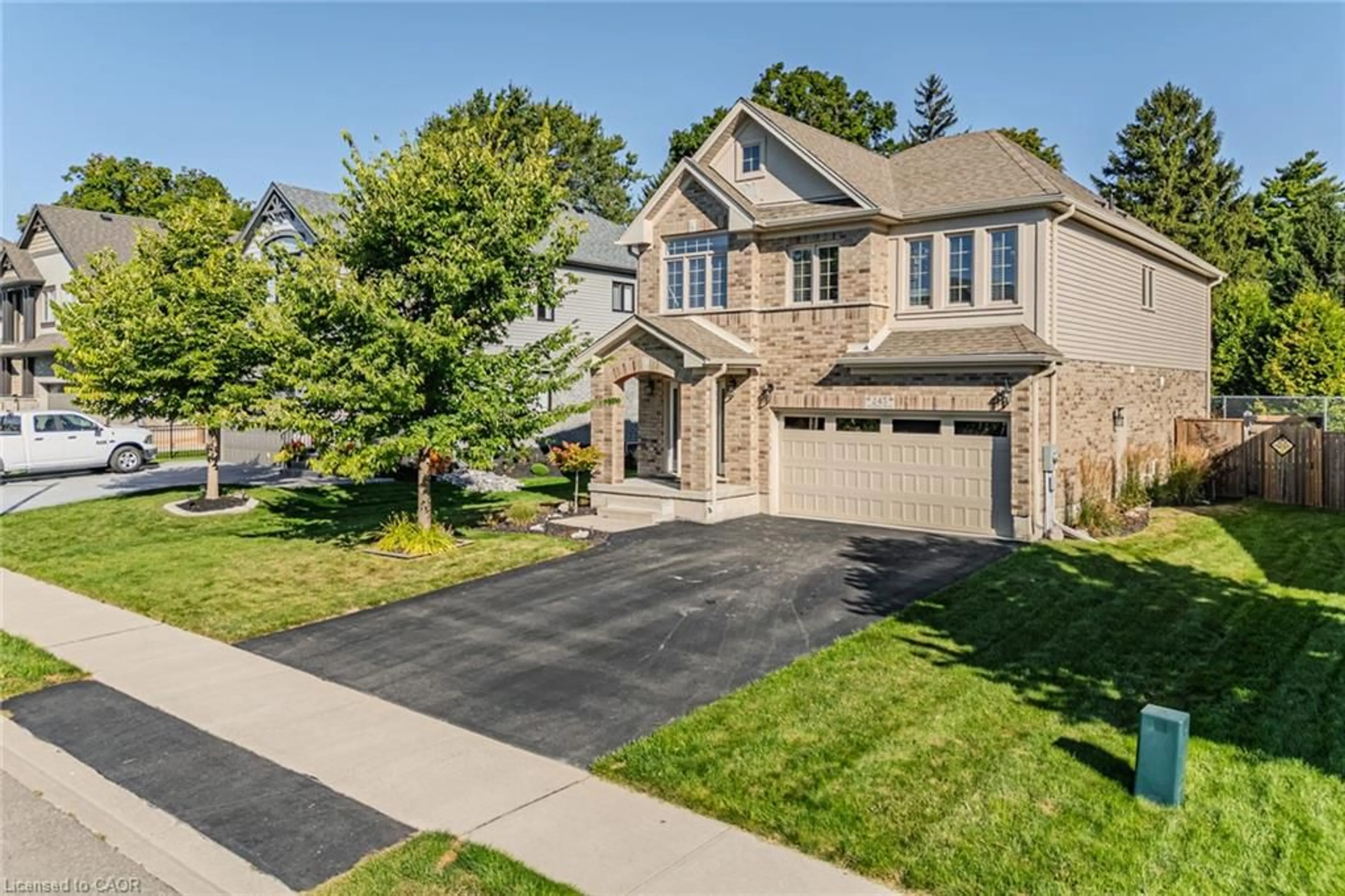 Home with brick exterior material, street for 245 Woodway Trail, Simcoe Ontario N3Y 0E1