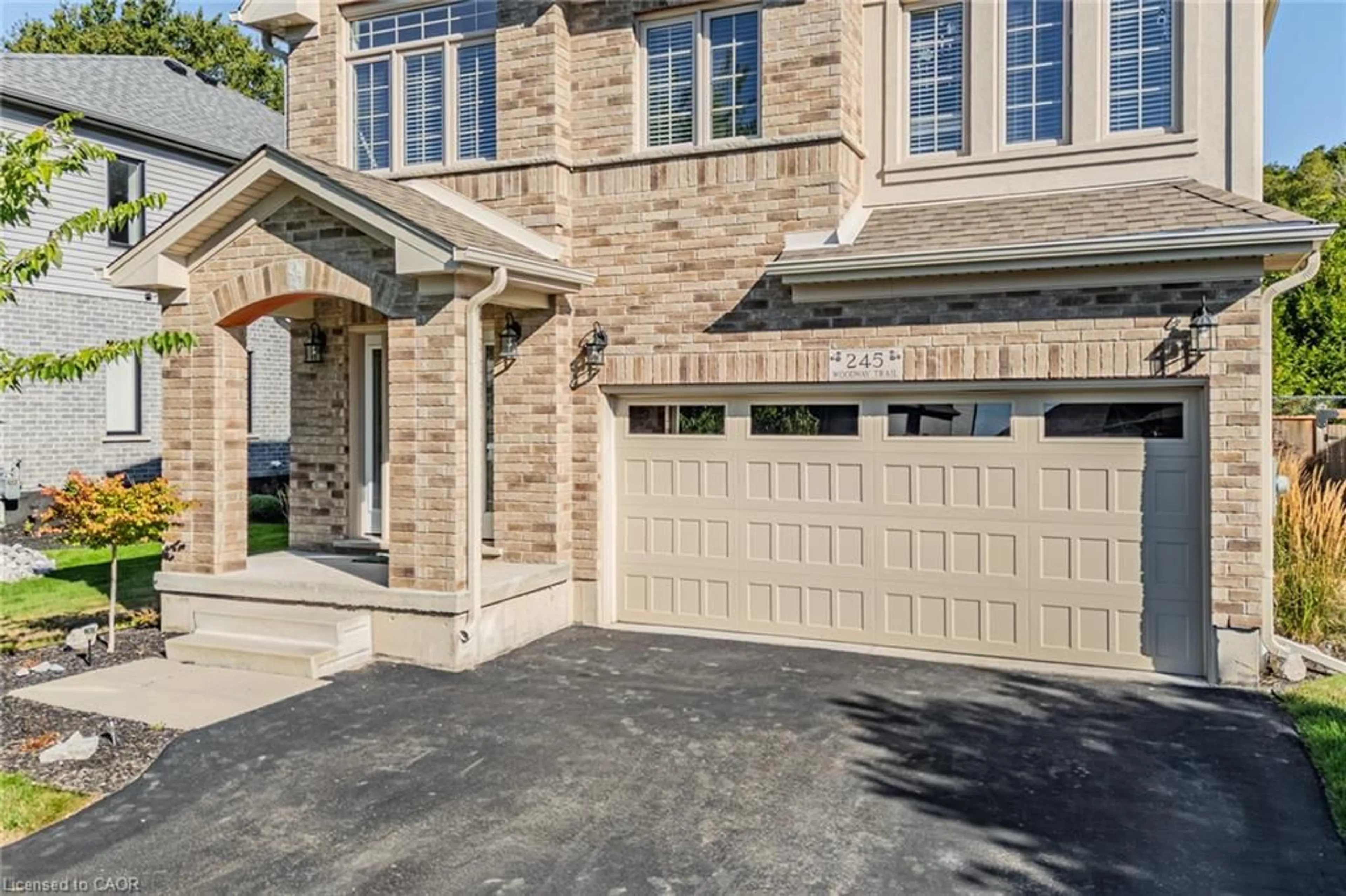 Home with brick exterior material, street for 245 Woodway Trail, Simcoe Ontario N3Y 0E1