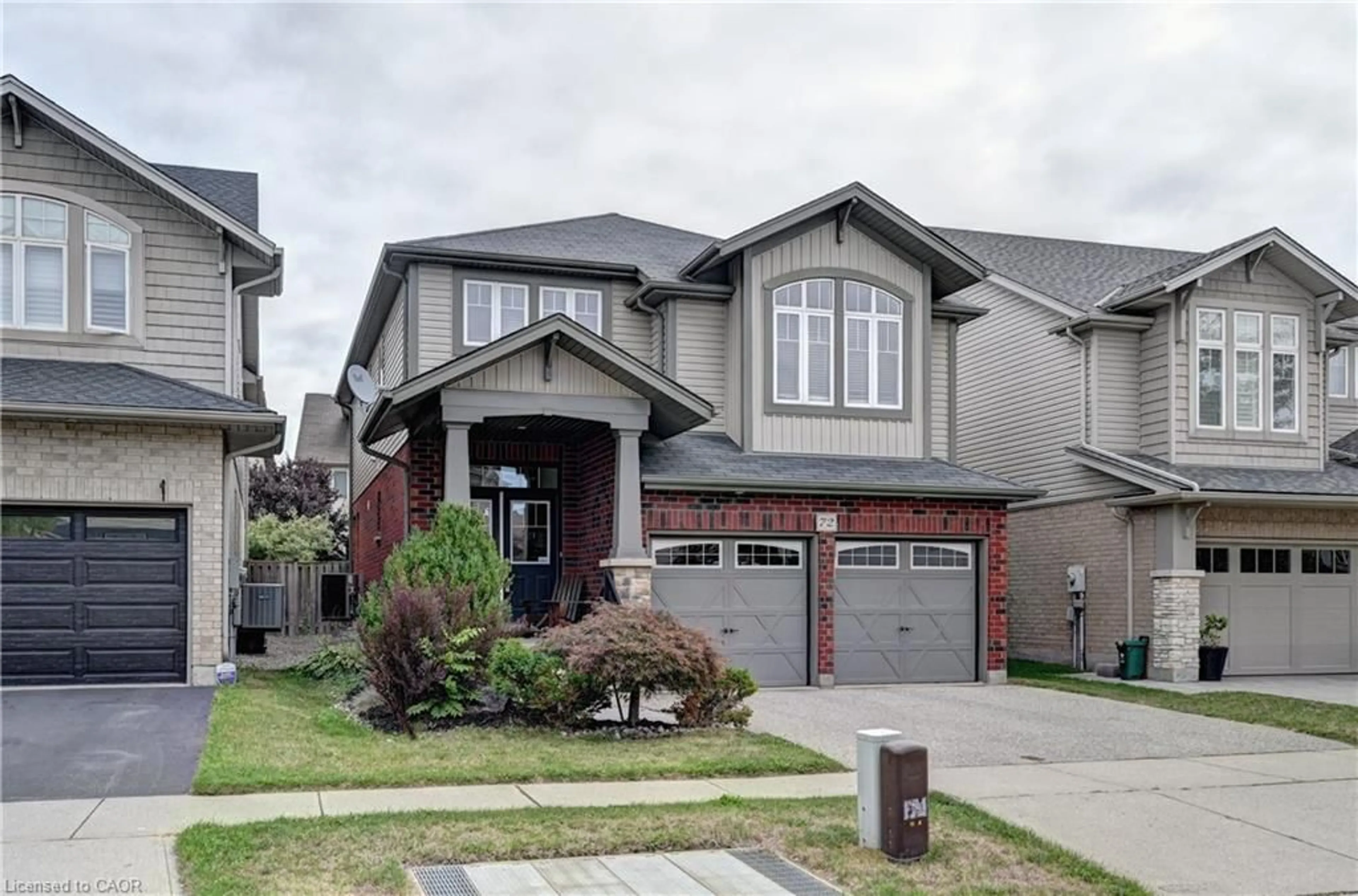 Home with brick exterior material, street for 72 Helena Feasby St, Kitchener Ontario N2E 4L5