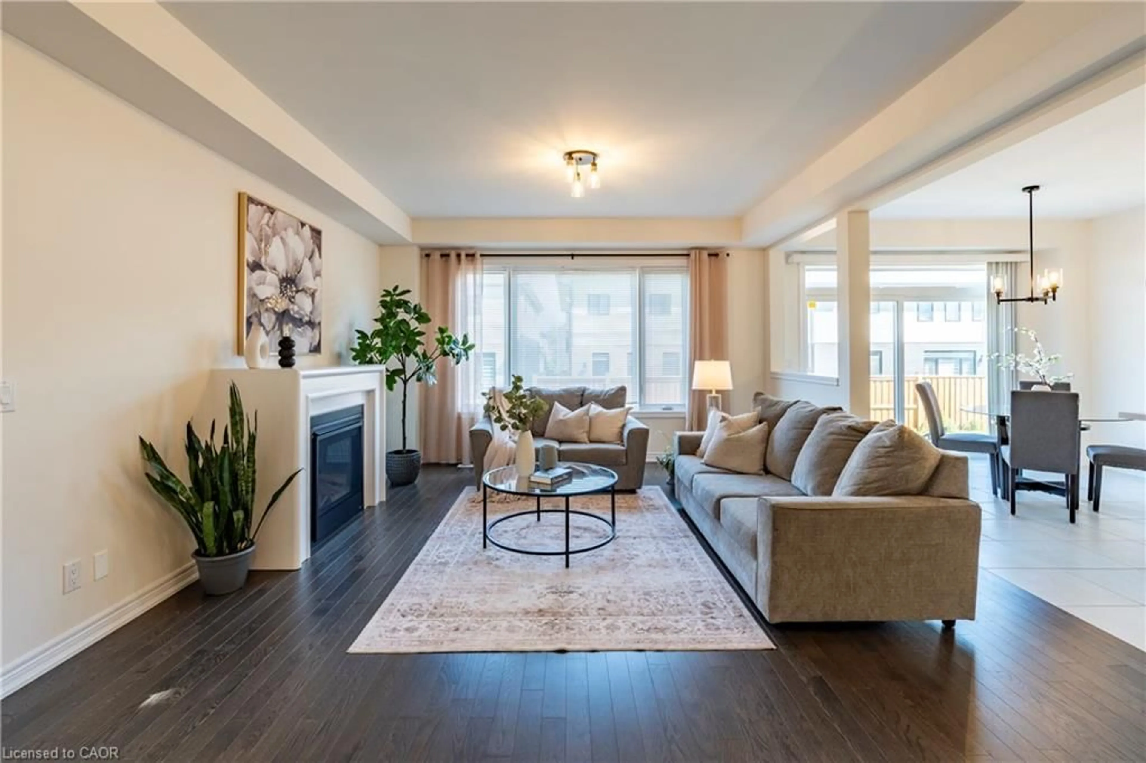 Living room with furniture, wood/laminate floor for 281 Broadacre Dr, Kitchener Ontario N2R 0S6