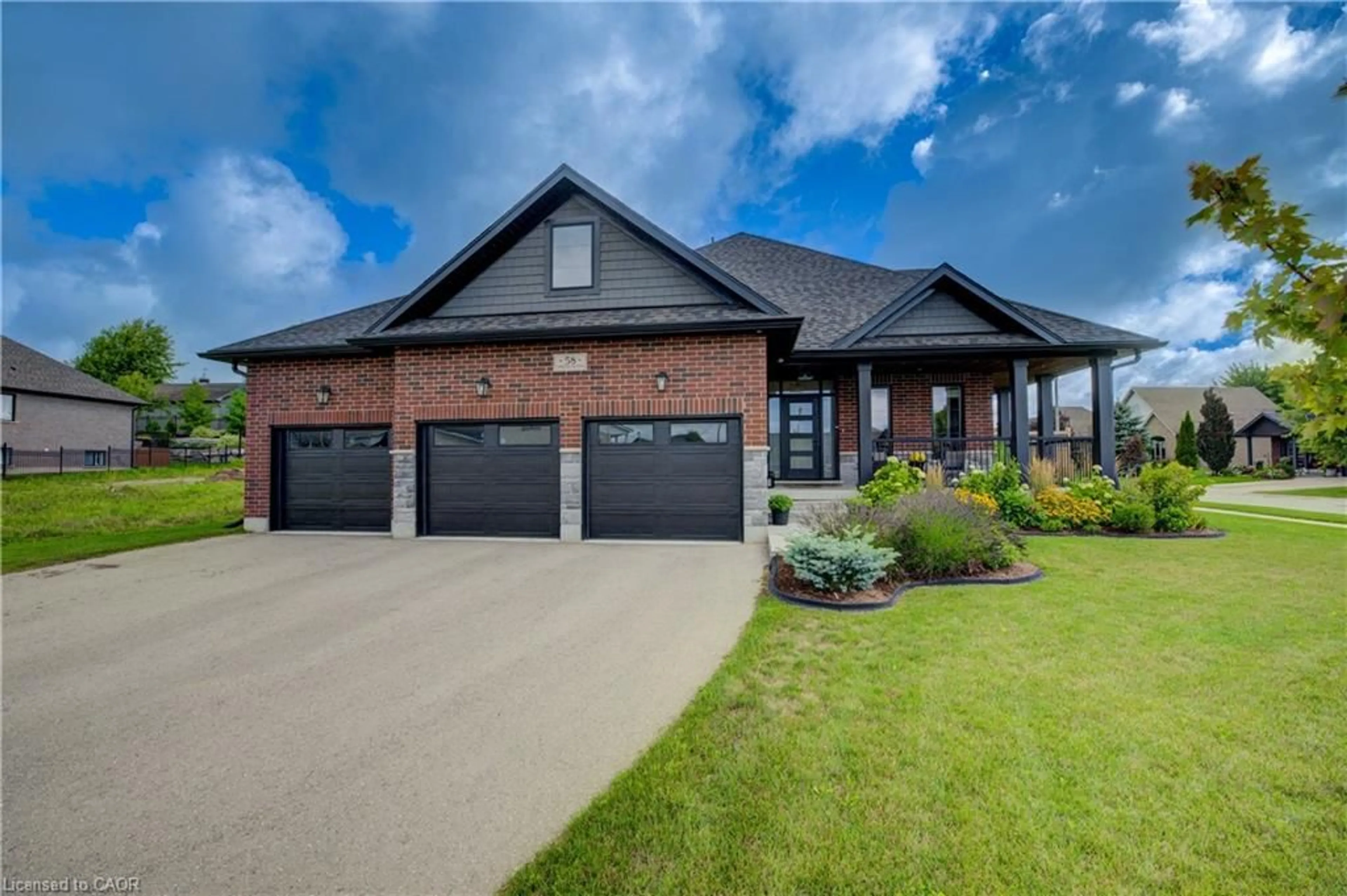 Home with brick exterior material, street for 58 Carriage Cross, Drayton Ontario N0G 1P0