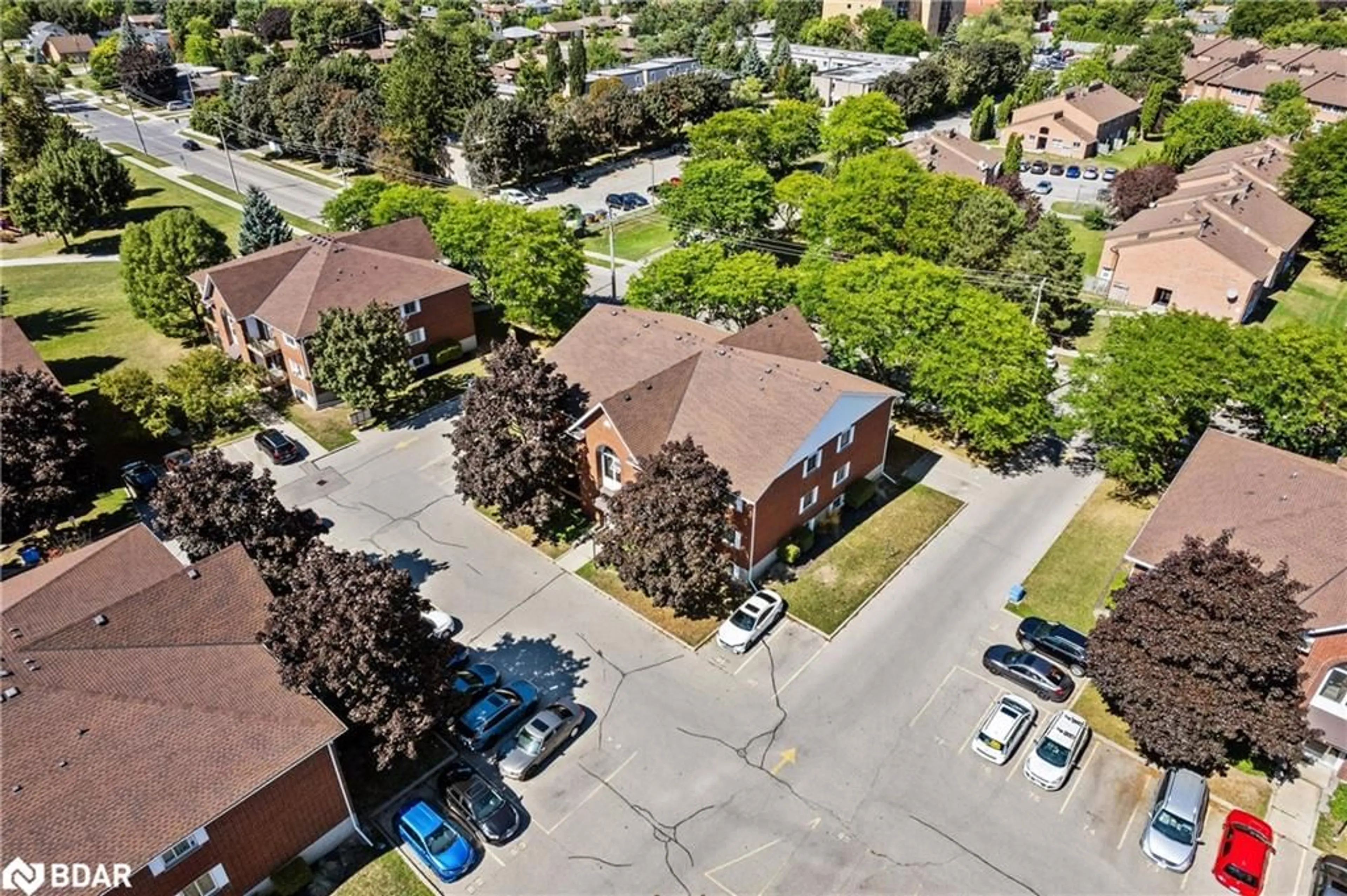 A pic from outside/outdoor area/front of a property/back of a property/a pic from drone, street for 565 Greenfield Ave #610, Kitchener Ontario N2C 2P4