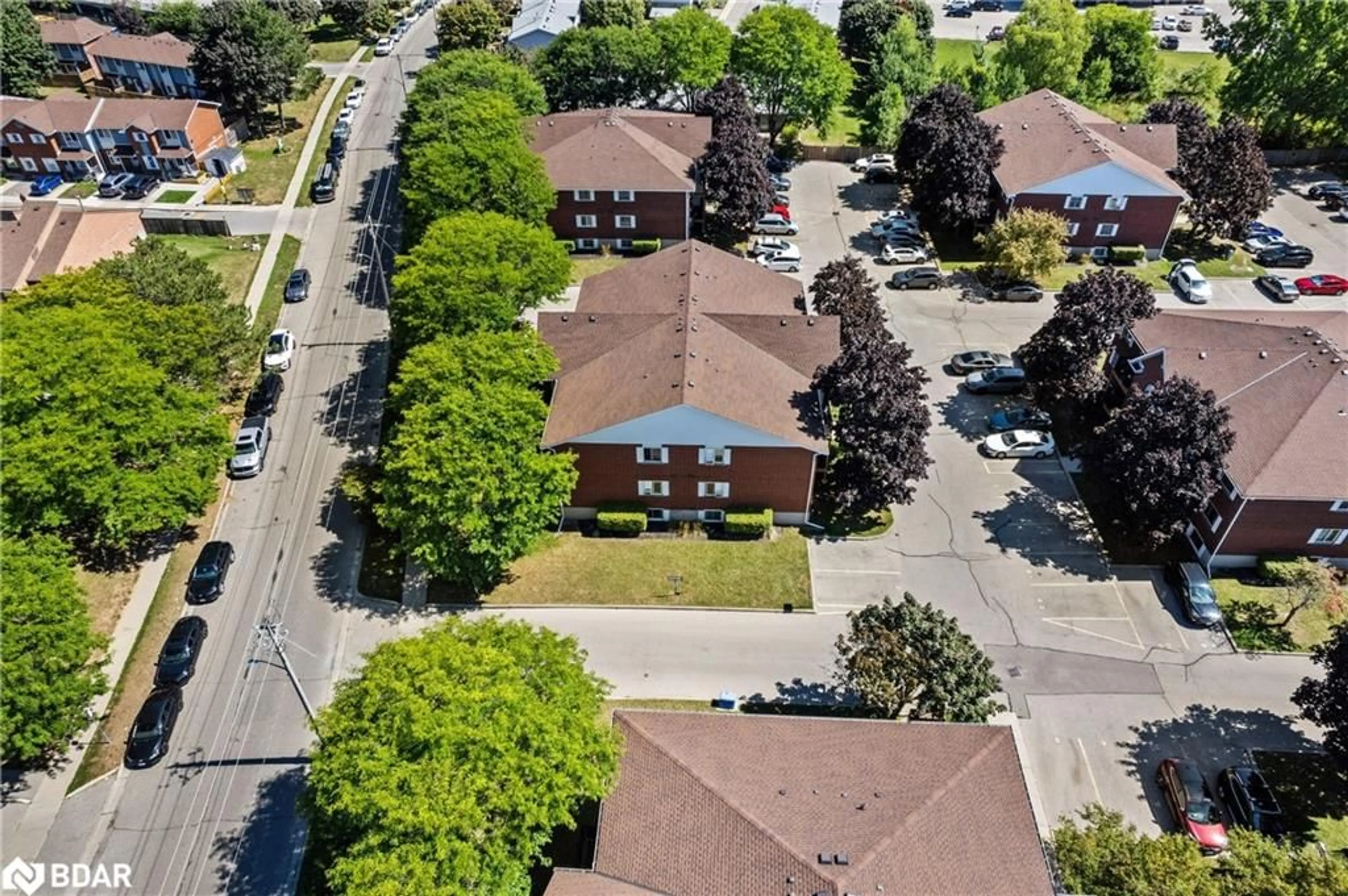 A pic from outside/outdoor area/front of a property/back of a property/a pic from drone, street for 565 Greenfield Ave #610, Kitchener Ontario N2C 2P4