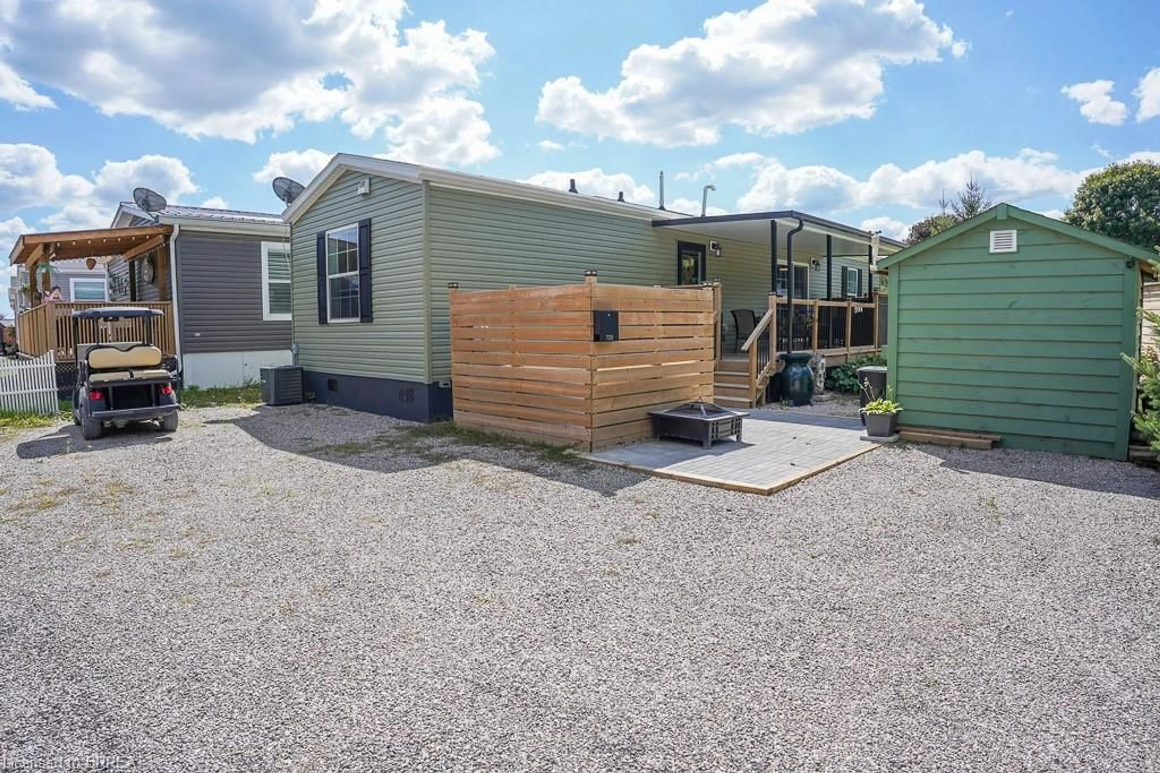 Home with vinyl exterior material, street for 99 Fourth Concession Rd #729, Burford Ontario N0E 1A0