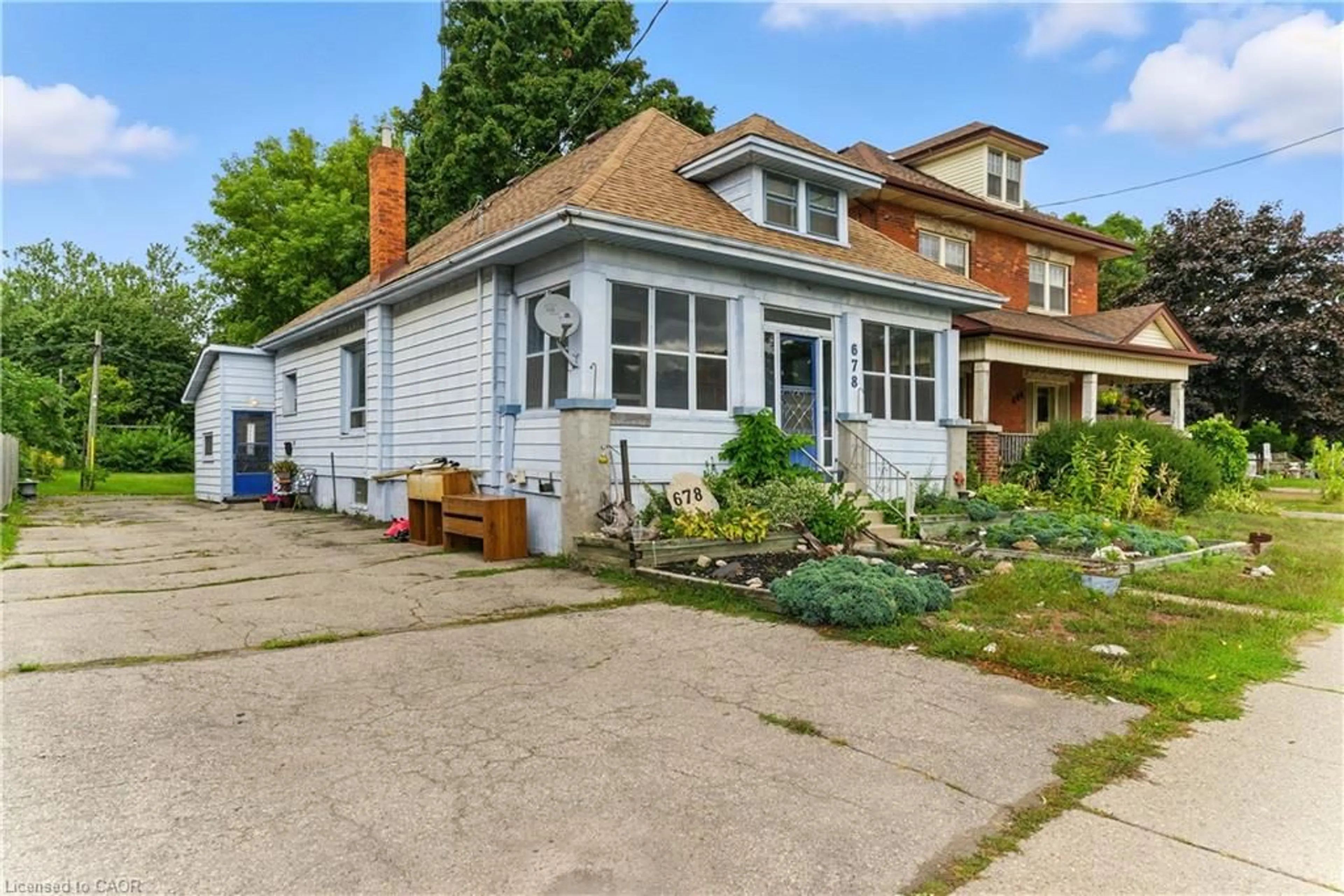 Home with brick exterior material, street for 678 Colborne St, Brantford Ontario N3S 3P9