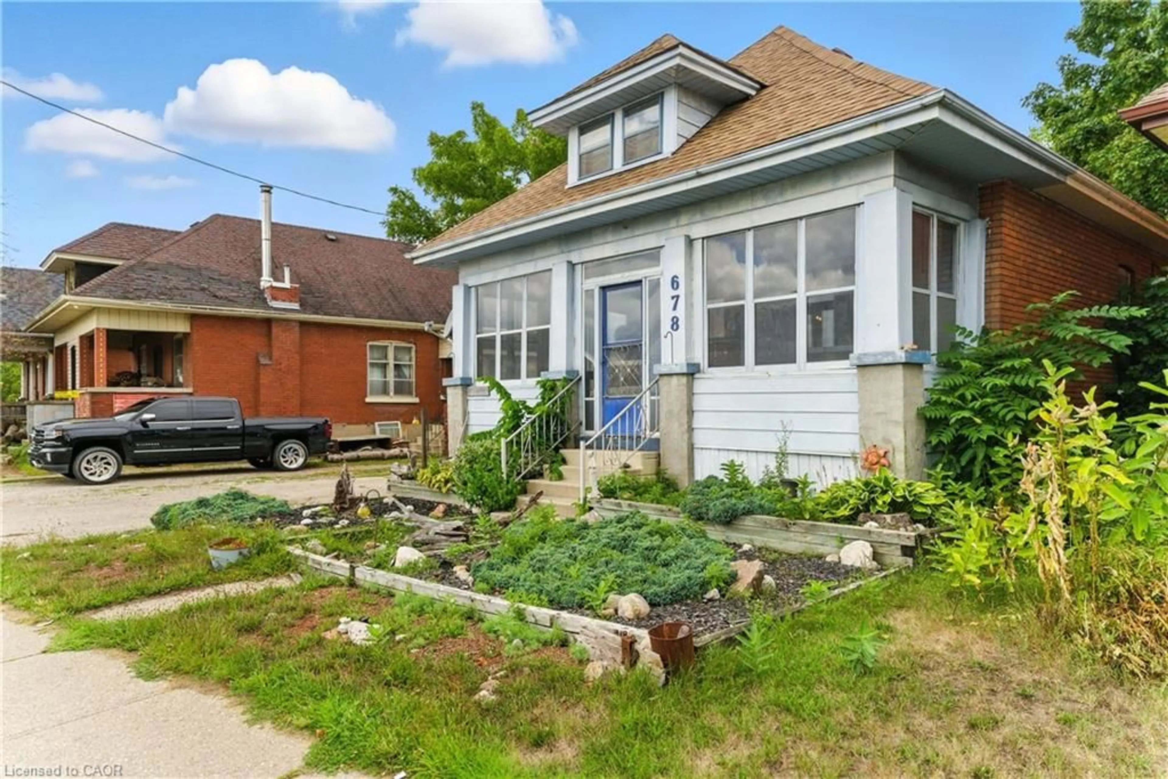 Home with brick exterior material, street for 678 Colborne St, Brantford Ontario N3S 3P9