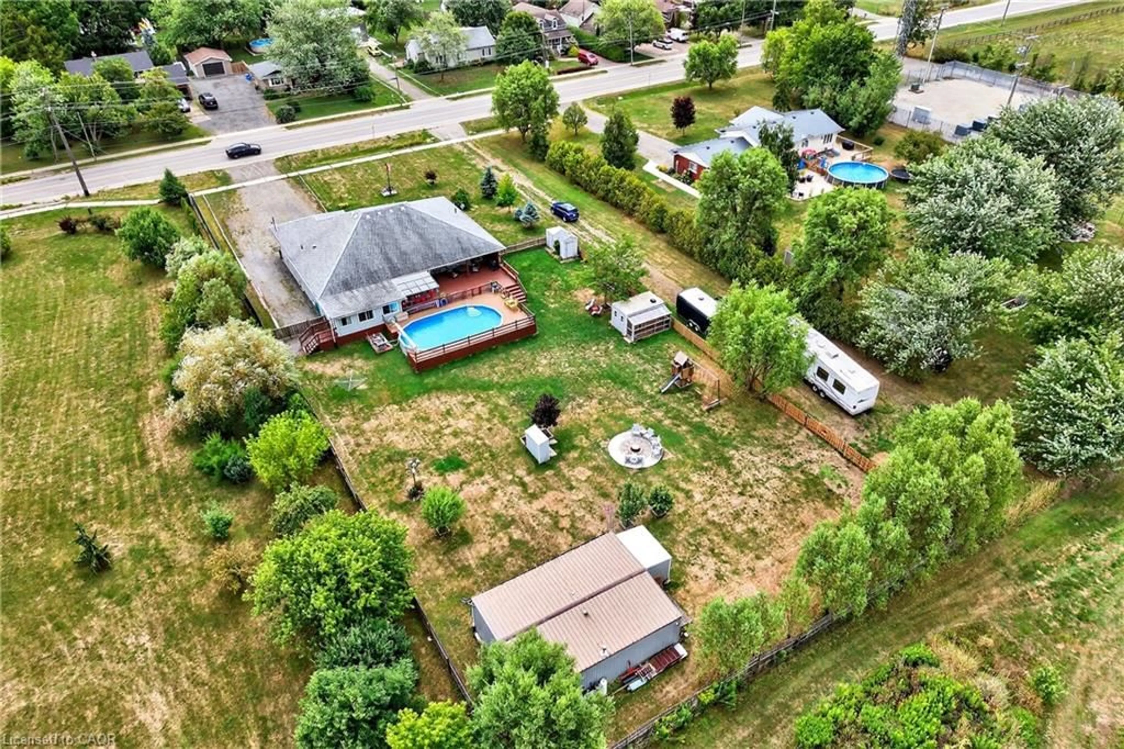 A pic from outside/outdoor area/front of a property/back of a property/a pic from drone, street for 4265 Fly Rd, Campden Ontario L0R 1G0