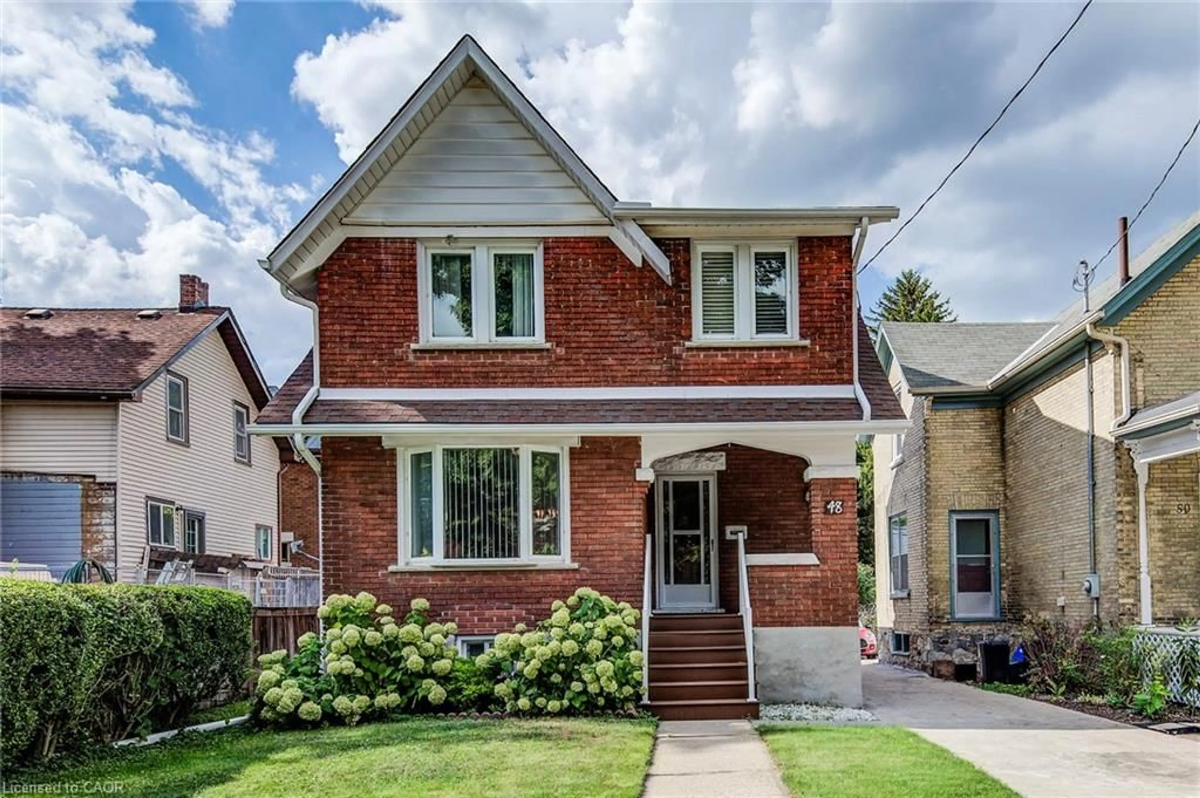 Home with brick exterior material, street for 48 John St, Waterloo Ontario N2J 1E8