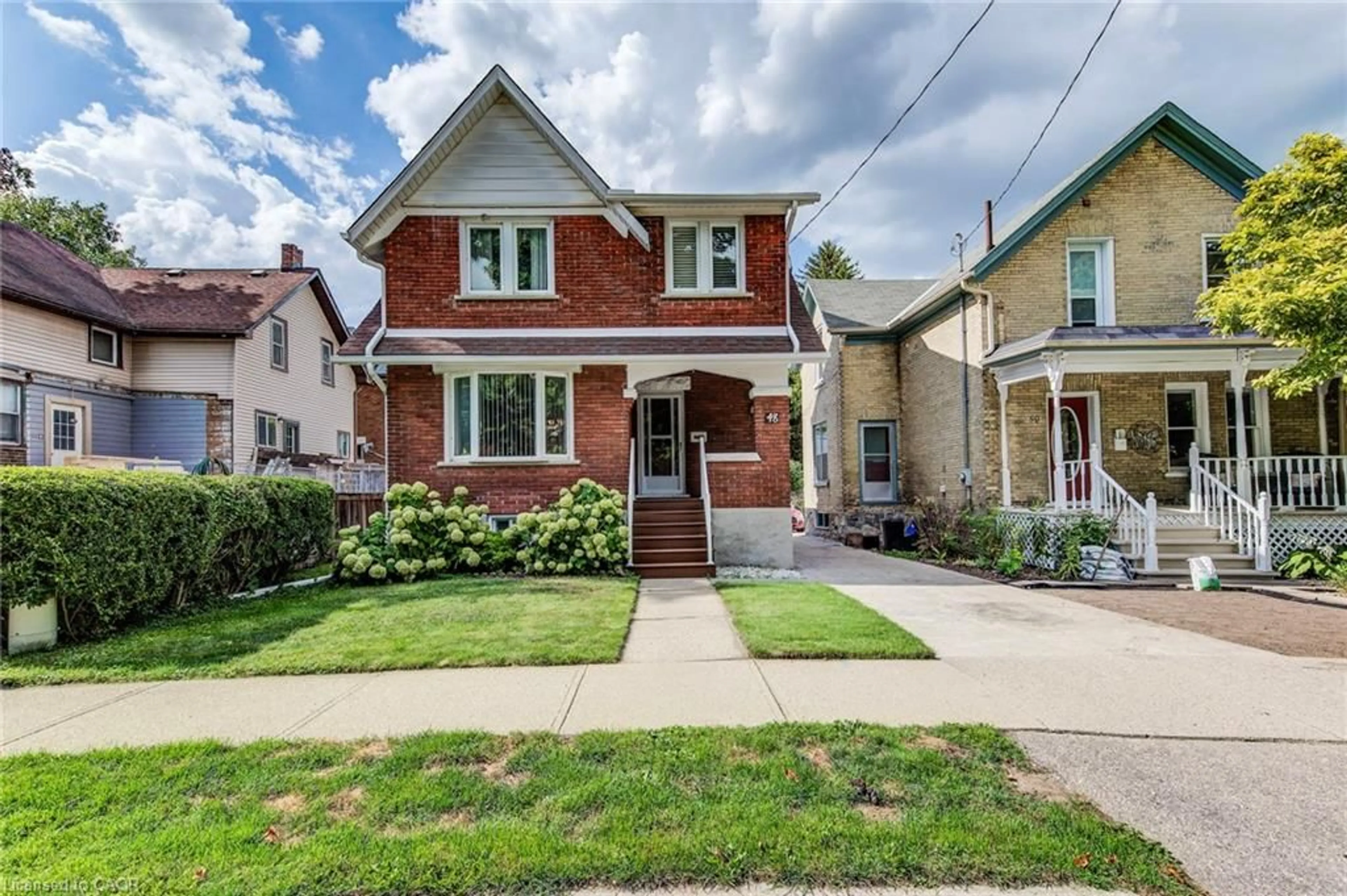 Home with brick exterior material, street for 48 John St, Waterloo Ontario N2J 1E8