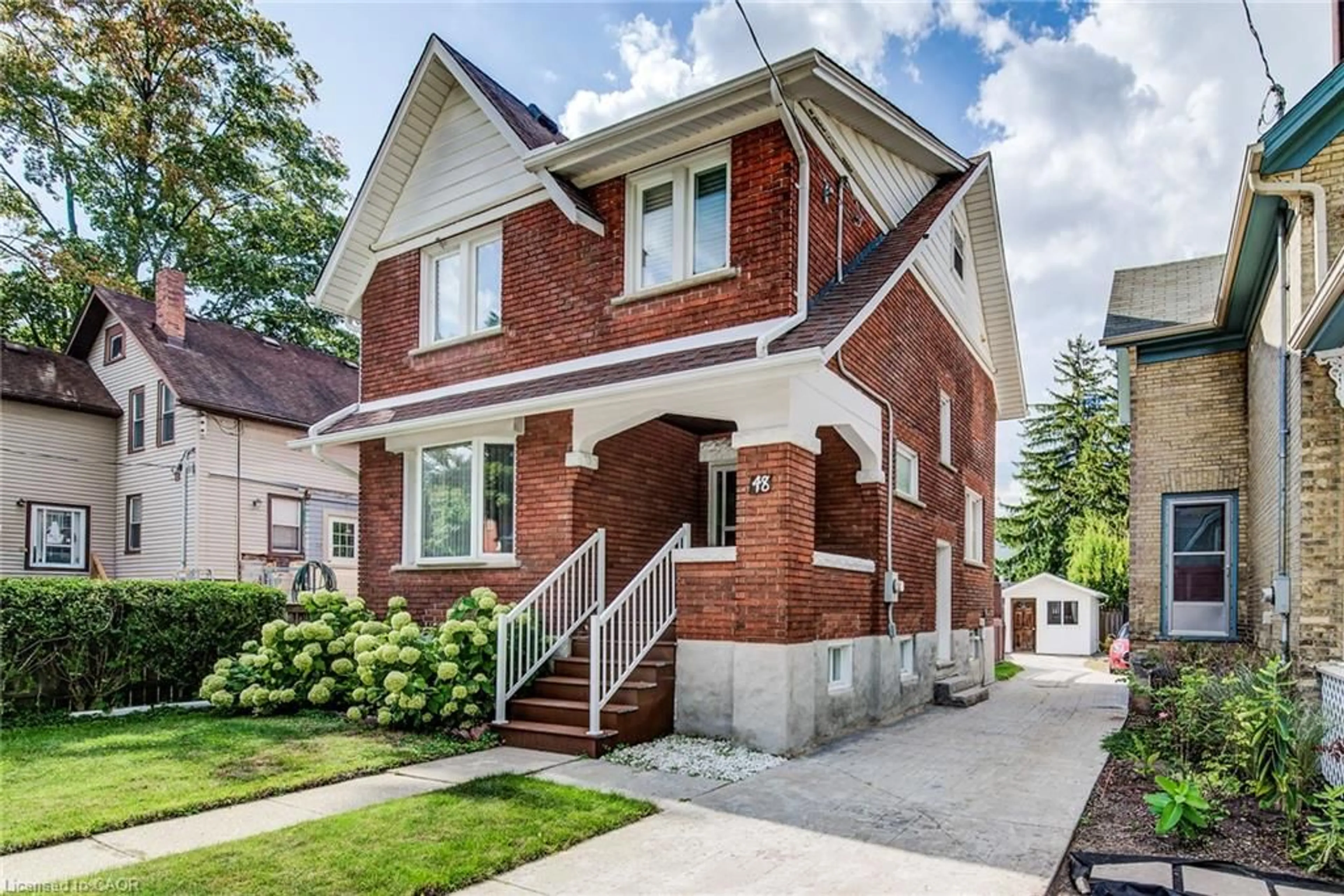 Home with brick exterior material, street for 48 John St, Waterloo Ontario N2J 1E8
