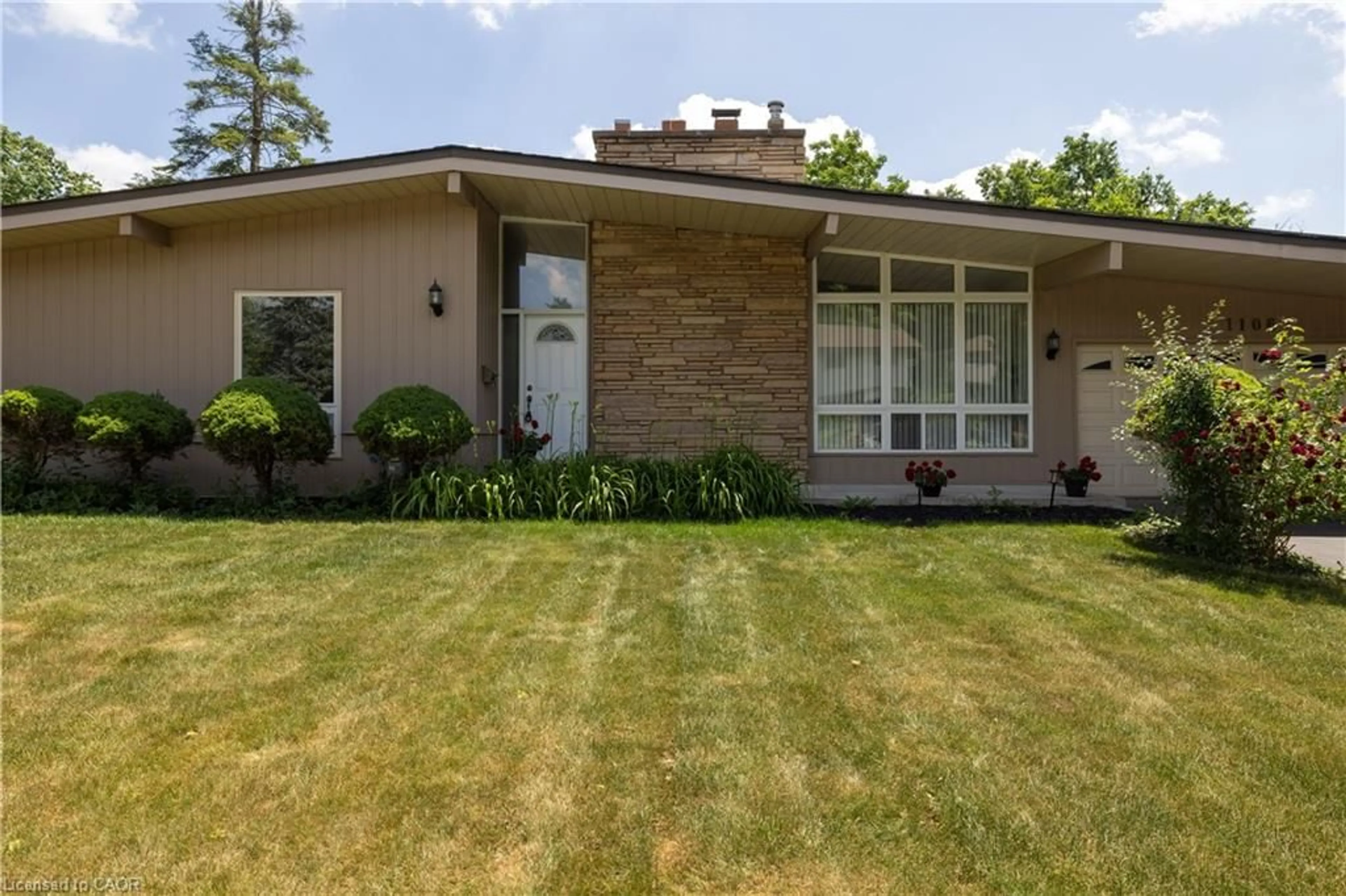 Home with brick exterior material, street for 1106 Falgarwood Dr, Oakville Ontario L6H 1N9