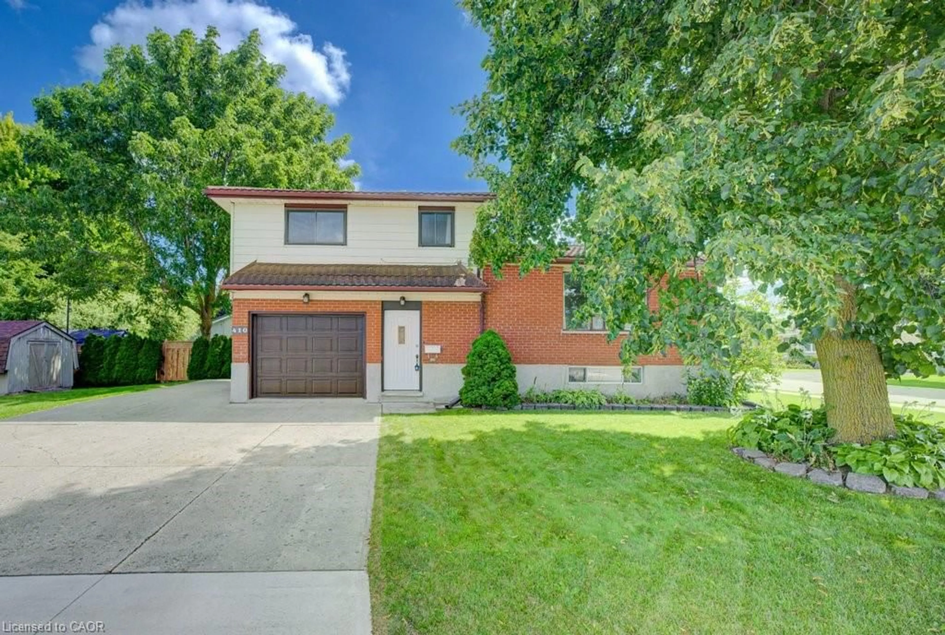 Home with brick exterior material, street for 410 Louise Ave, Listowel Ontario N4W 3P2