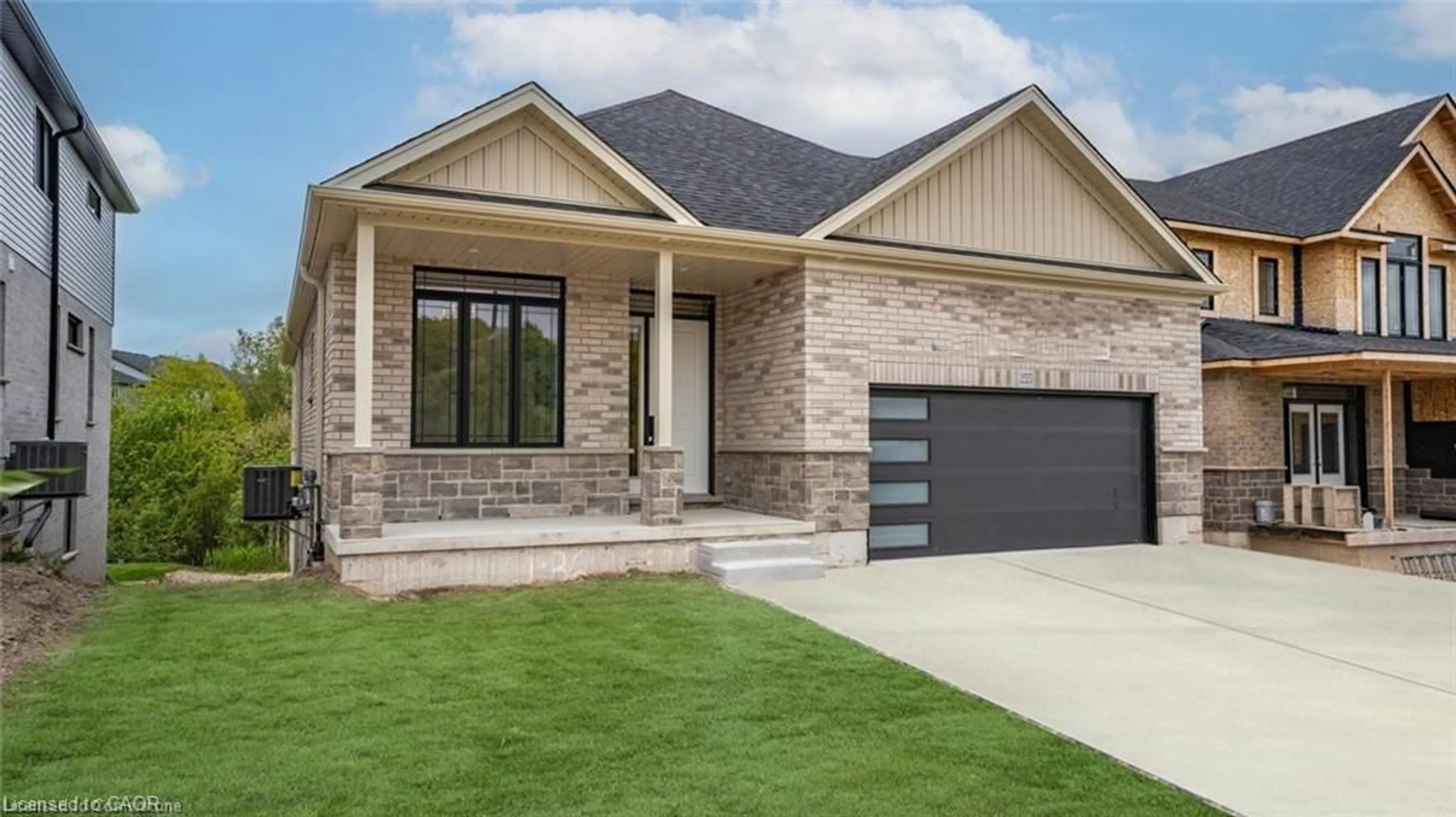 Home with brick exterior material, street for 255 Ladyslipper Dr, Waterloo Ontario N2V 0C3