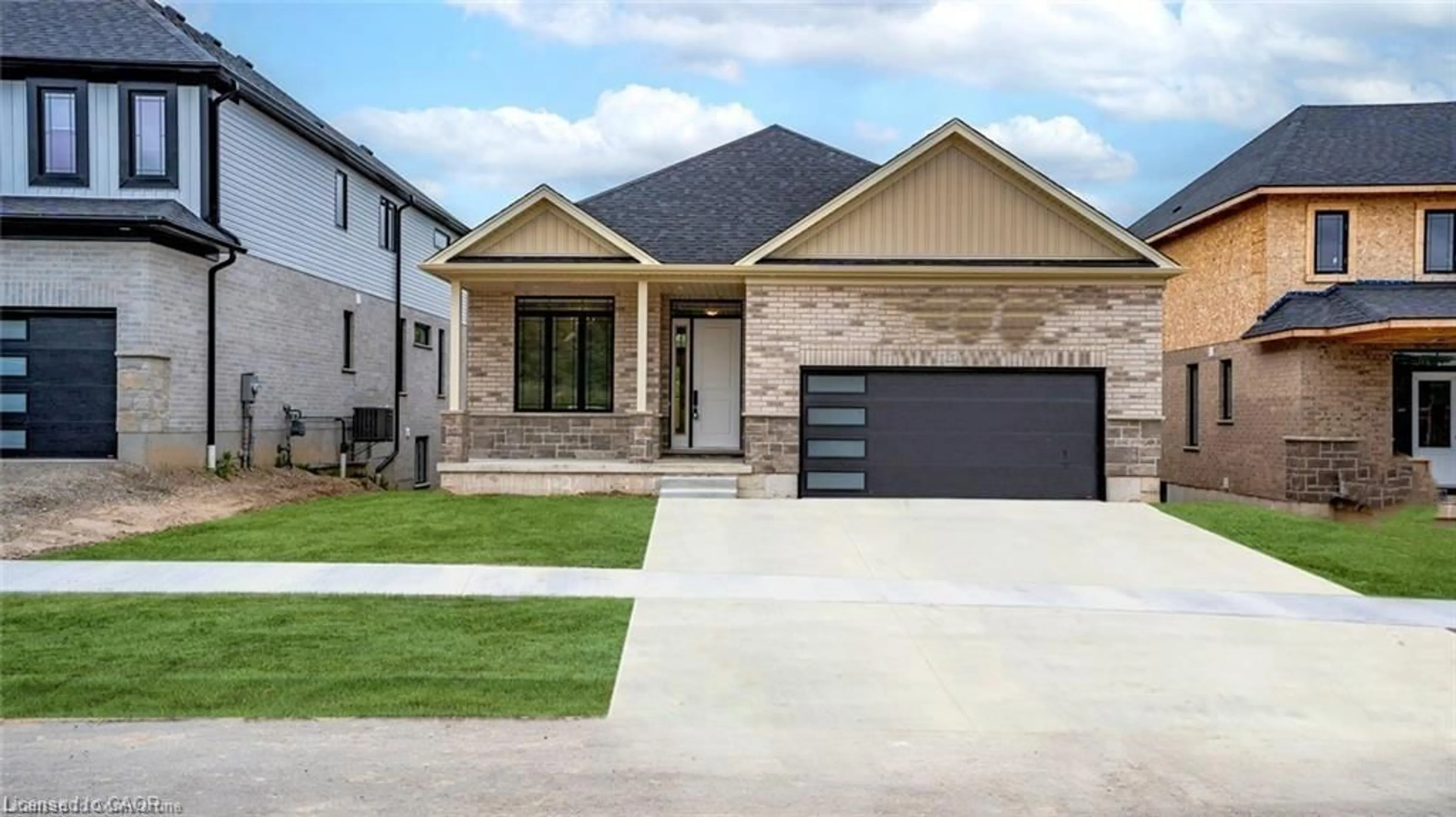 Home with brick exterior material, street for 255 Ladyslipper Dr, Waterloo Ontario N2V 0C3