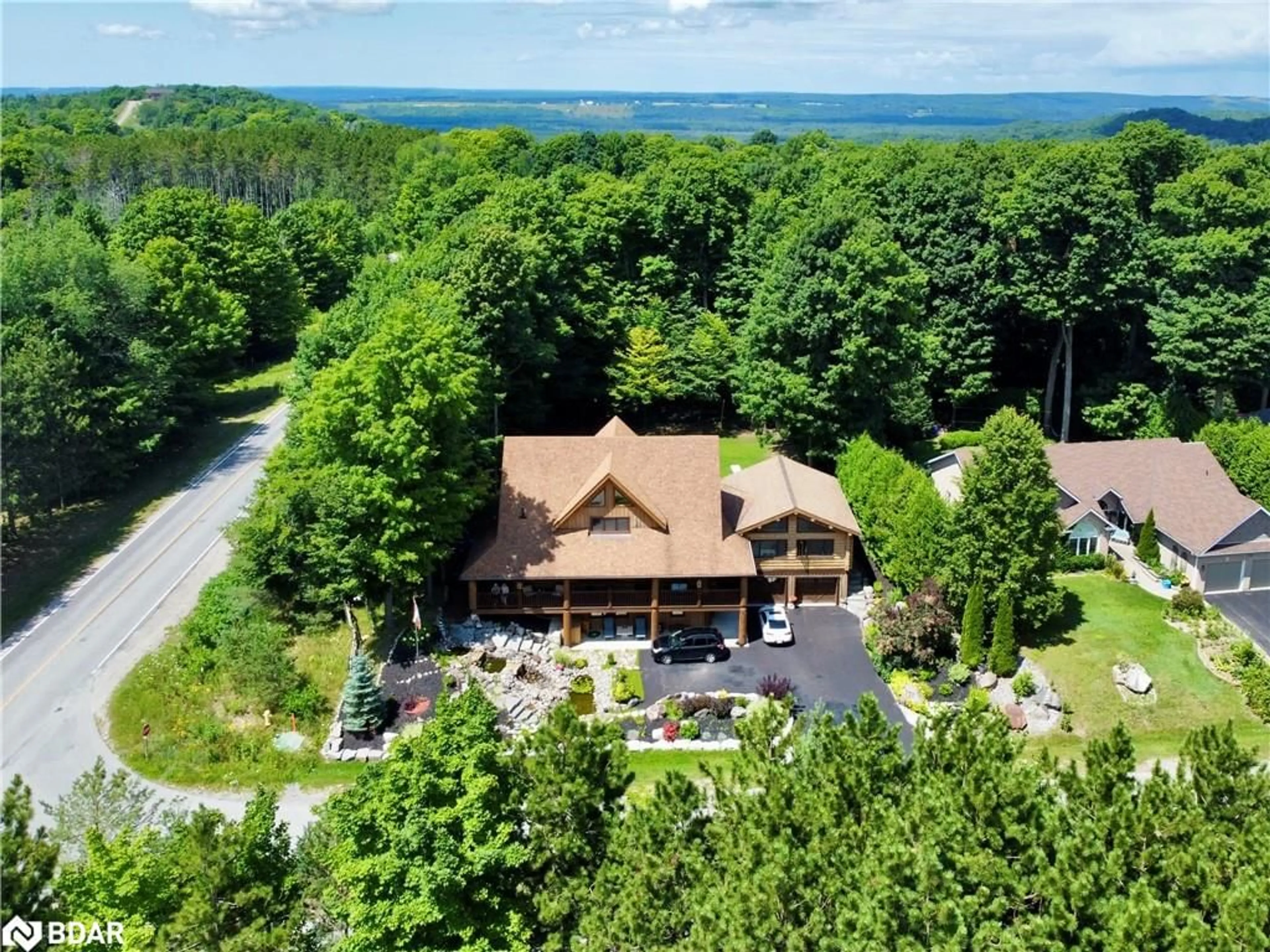 A pic from outside/outdoor area/front of a property/back of a property/a pic from drone, unknown for 118 Highland Dr, Oro-Medonte Ontario L0L 2L0