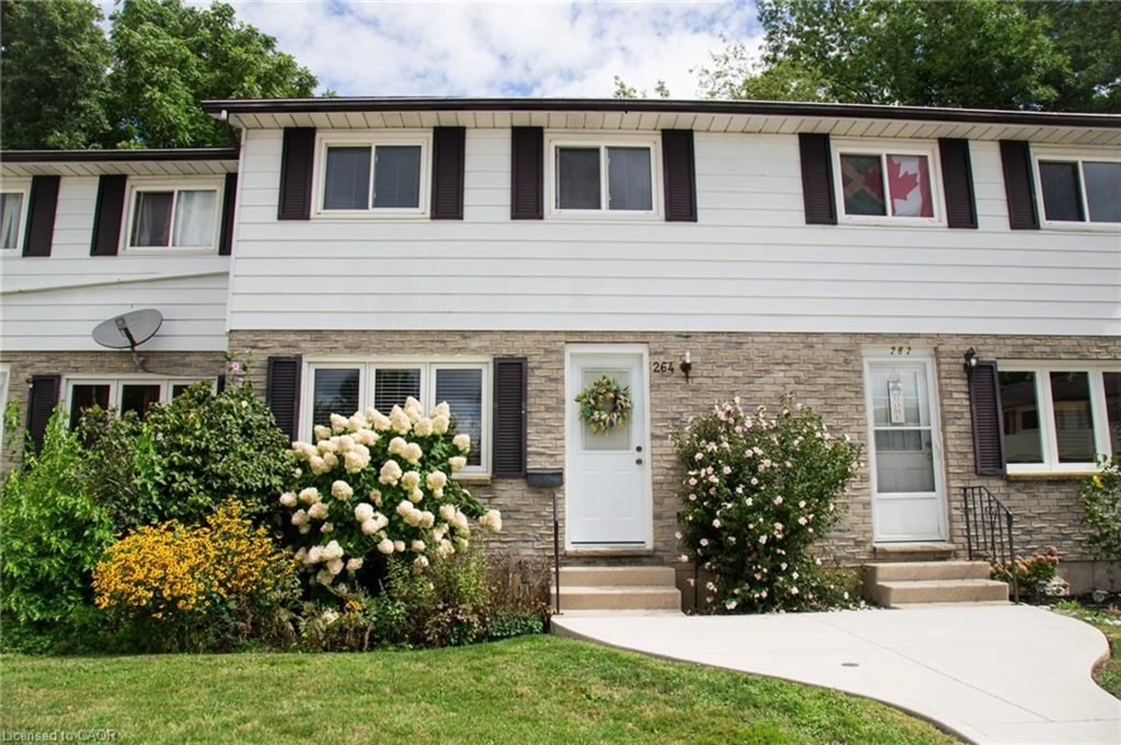 Home with vinyl exterior material, street for 264 Richardson Dr #3, Port Dover Ontario N0A 1N4