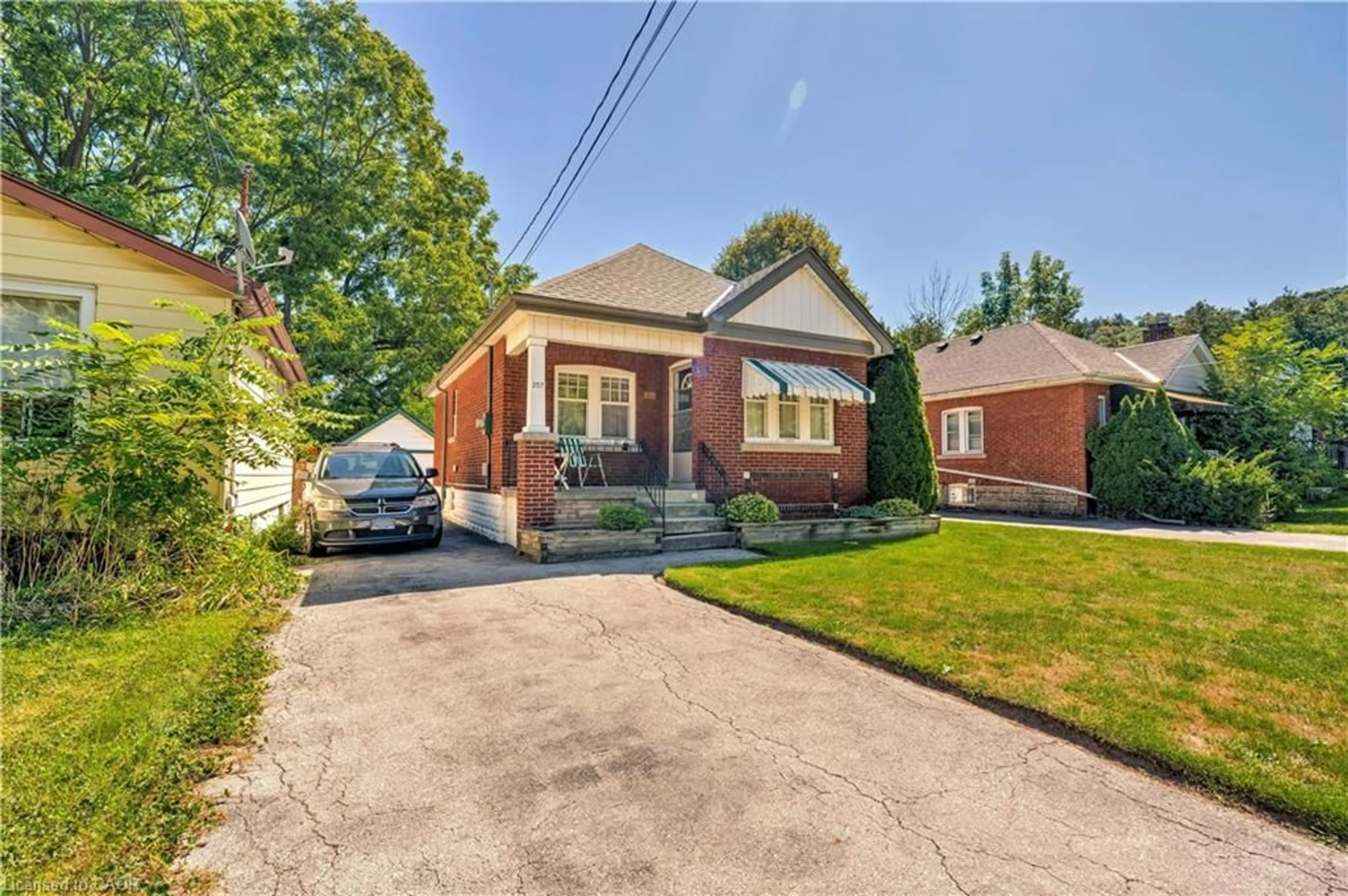 Home with brick exterior material, street for 257 Broadway Ave, Hamilton Ontario L8S 2W7