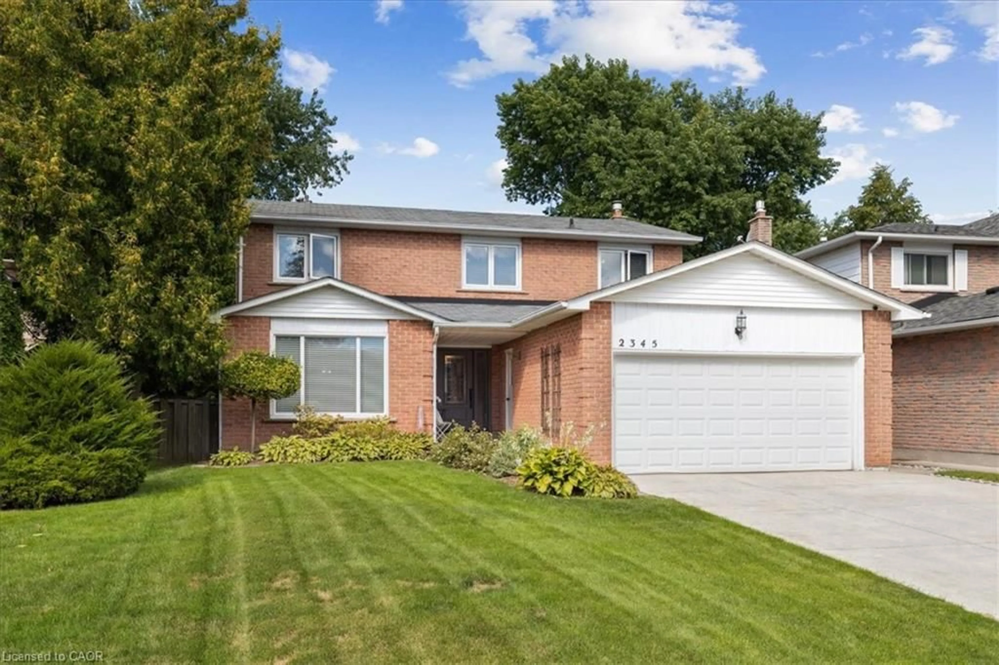 Home with brick exterior material, street for 2345 Montgomery Dr, Burlington Ontario L7P 4J9
