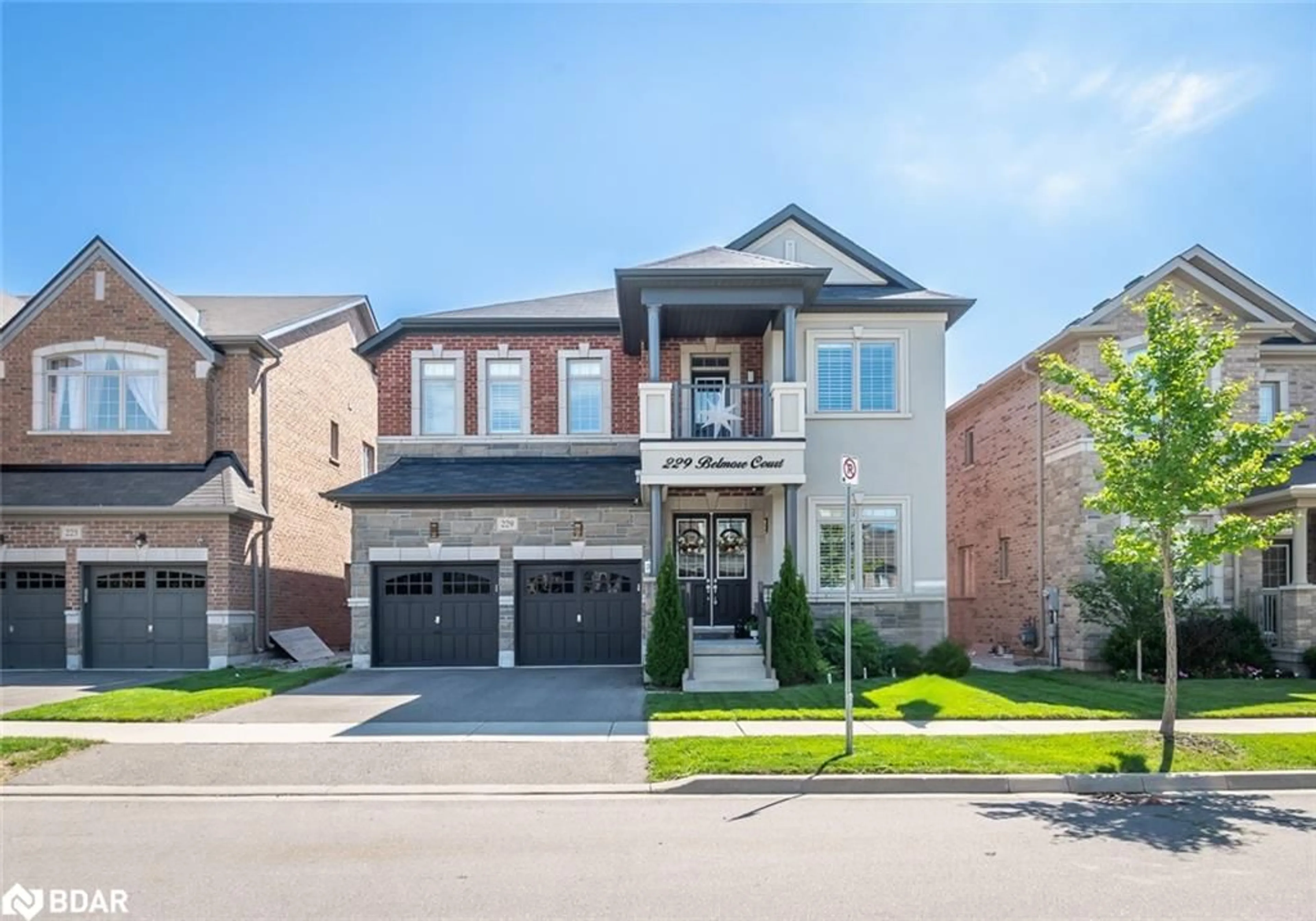Home with brick exterior material, street for 229 Belmore Crt, Milton Ontario L9E 1H5