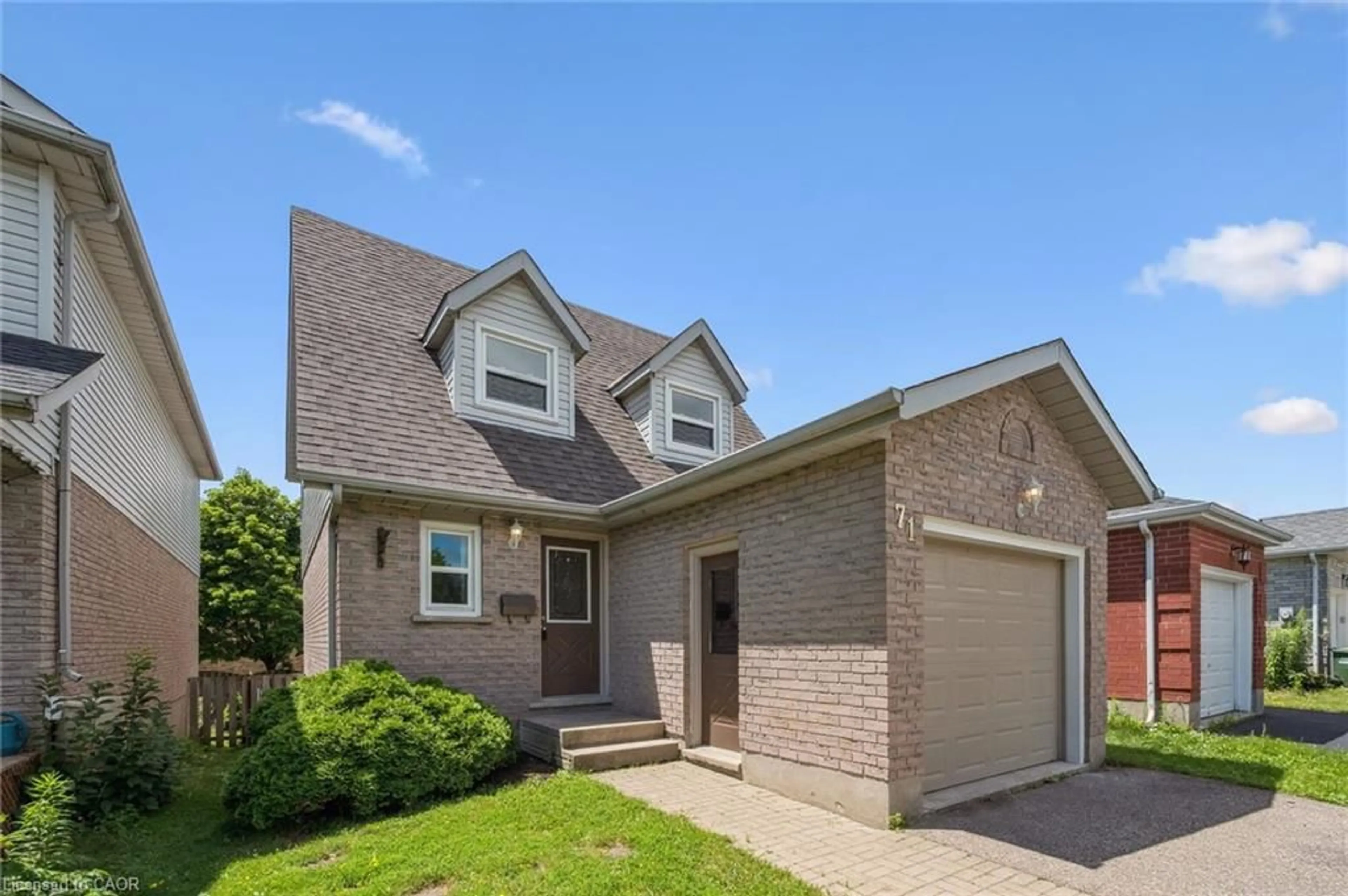 Home with brick exterior material, street for 71 Moss Pl, Guelph Ontario N1G 4V3