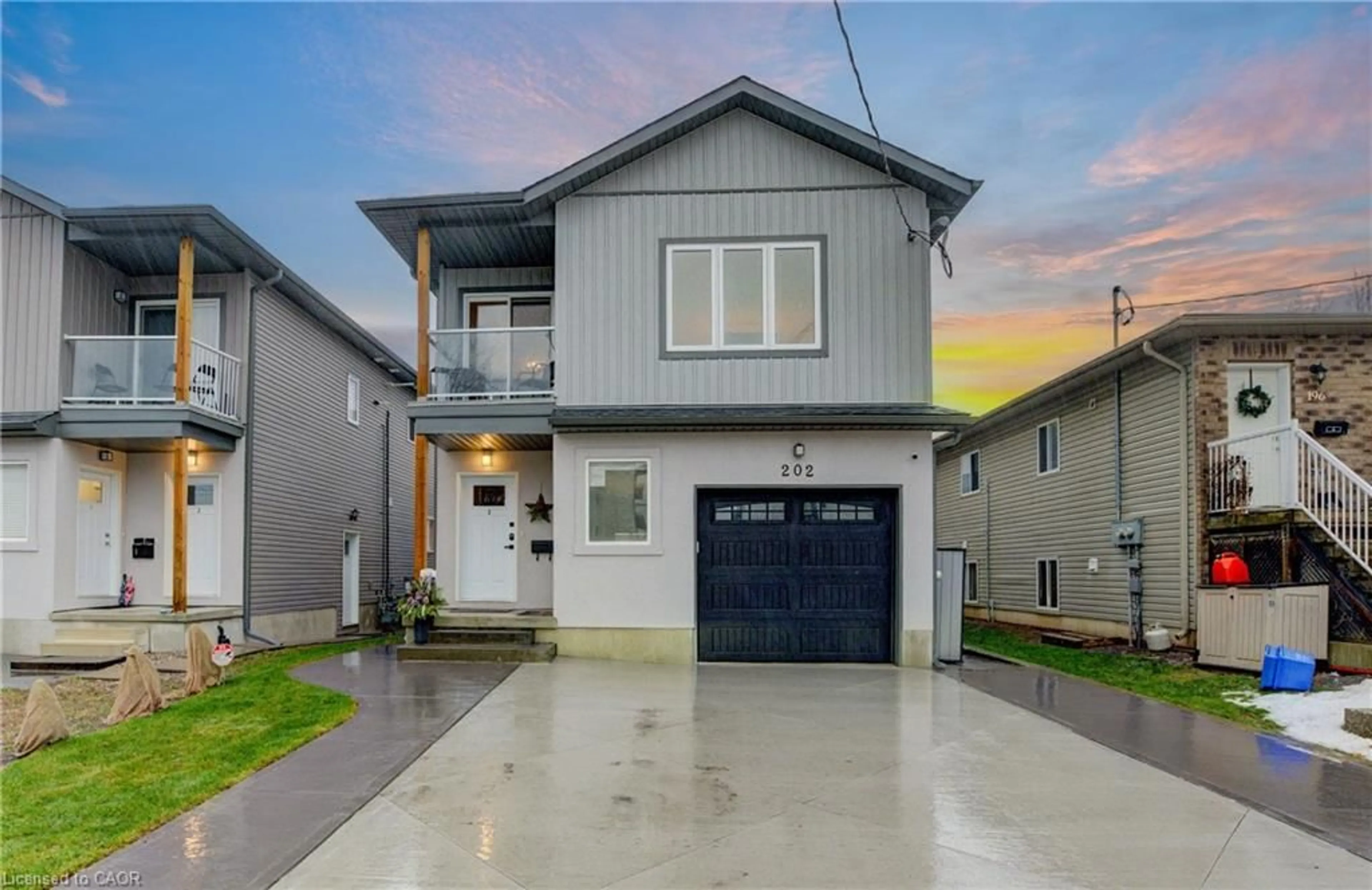 Home with vinyl exterior material, street for 202 Fifth Ave, Kitchener Ontario N2C 1P7