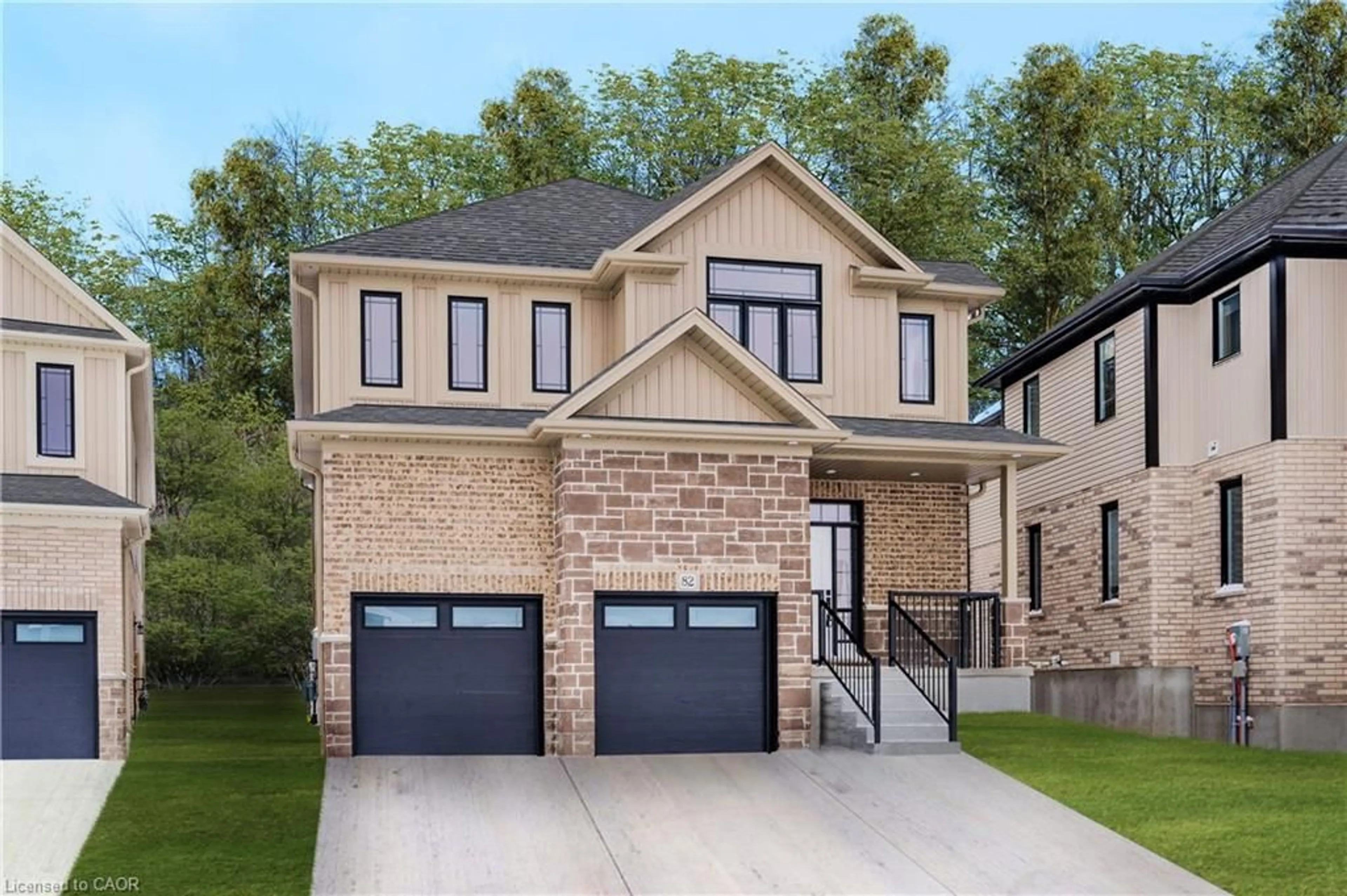 Home with brick exterior material, street for 82 Quarry Park Dr, Kitchener Ontario N2B 3J7