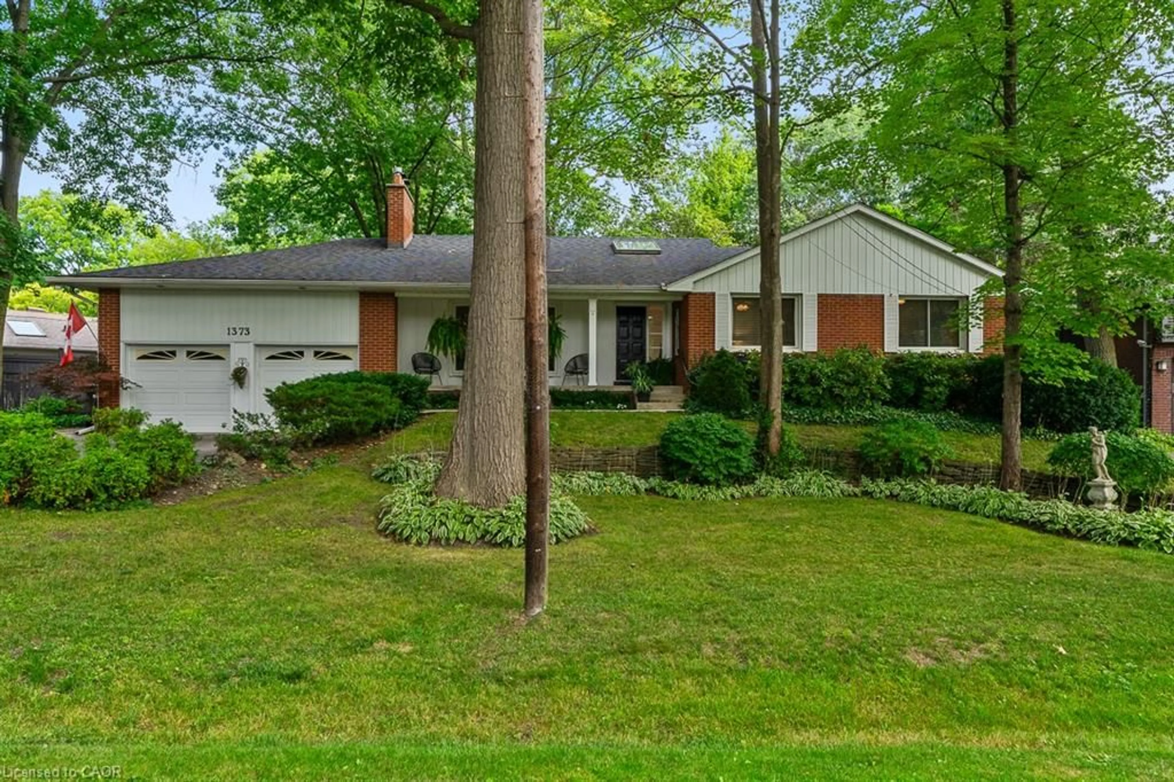 Home with brick exterior material, street for 1373 Queen Victoria Ave, Mississauga Ontario L5H 3H2