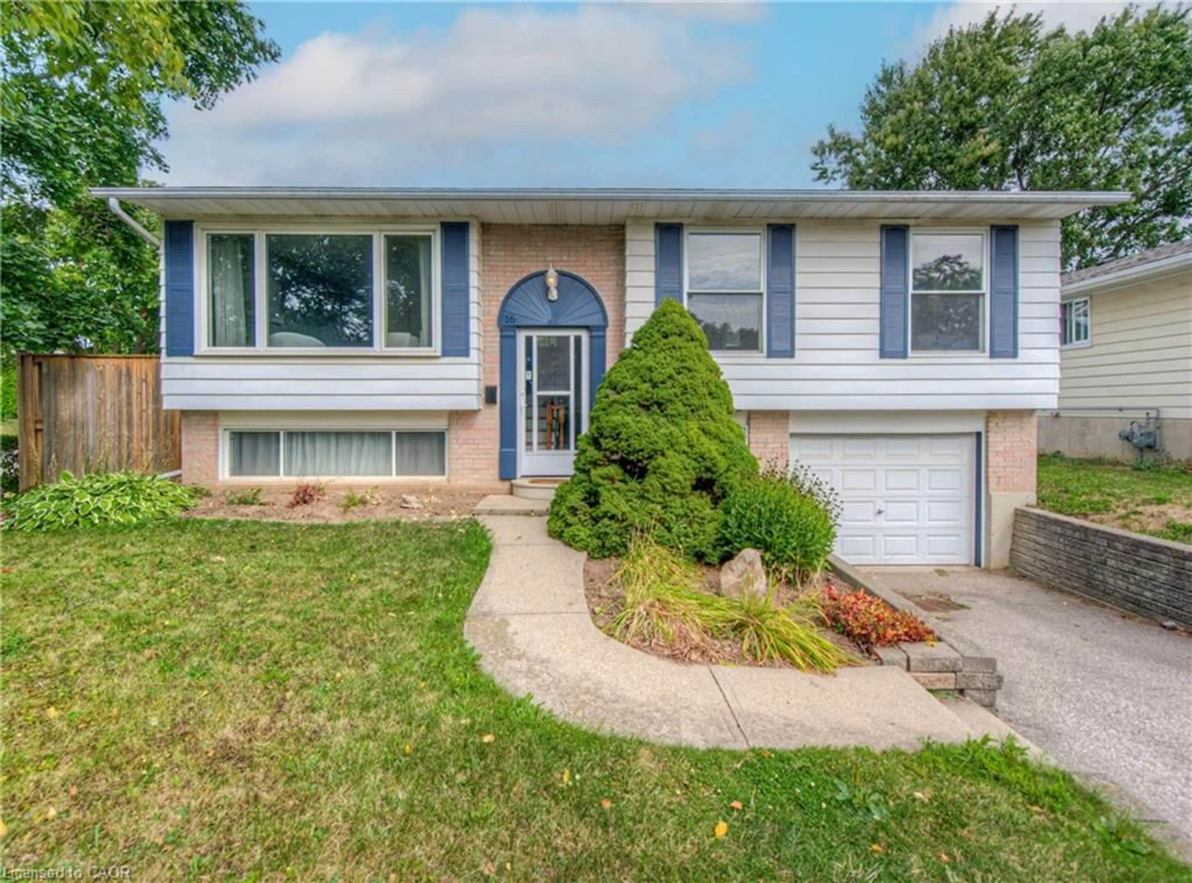 Home with vinyl exterior material, street for 16 Brisbane Blvd, Brantford Ontario N3S 4L2