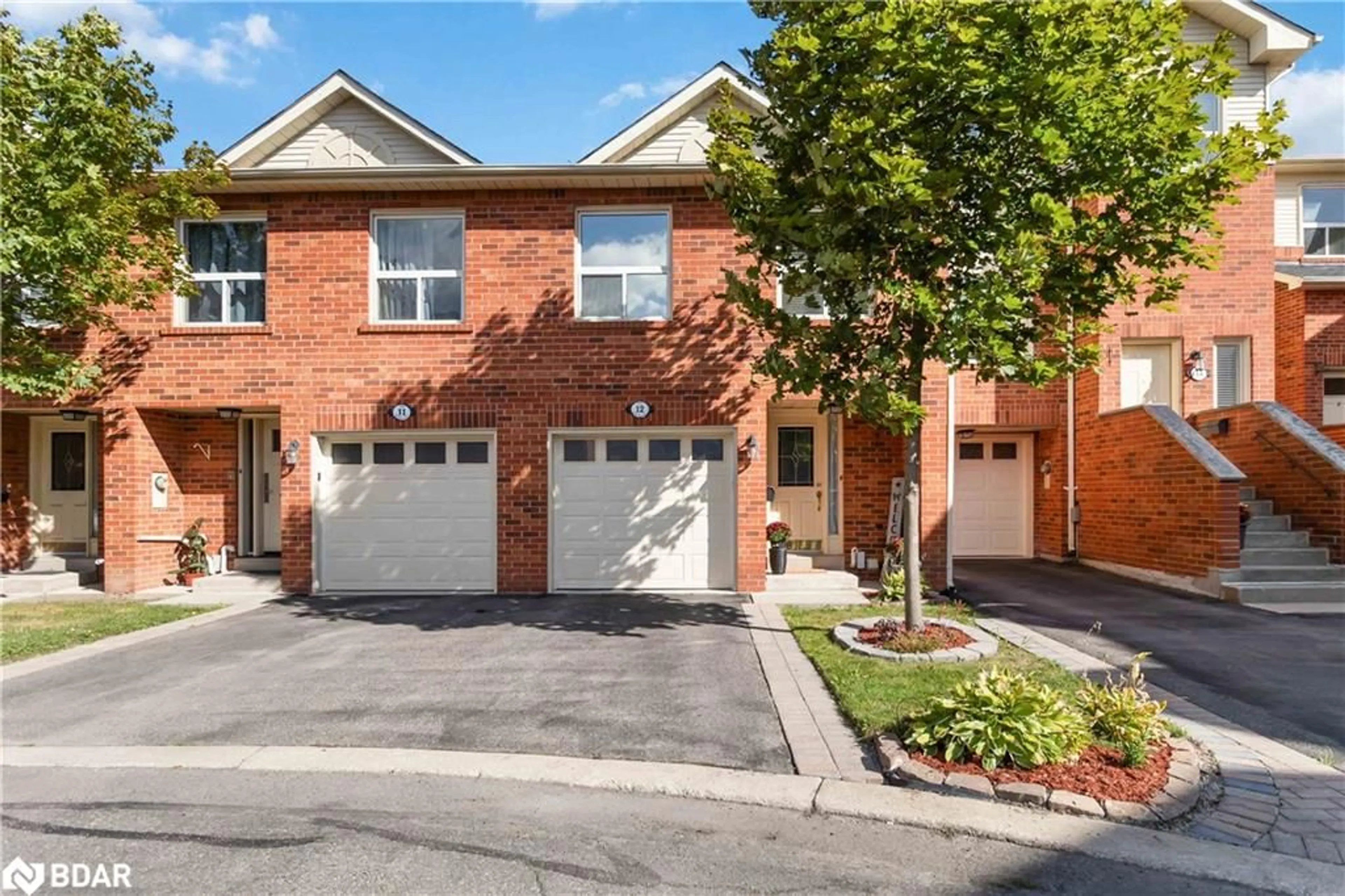 Home with brick exterior material, street for 1520 Reeves Gate #12, Oakville Ontario L6M 3J4