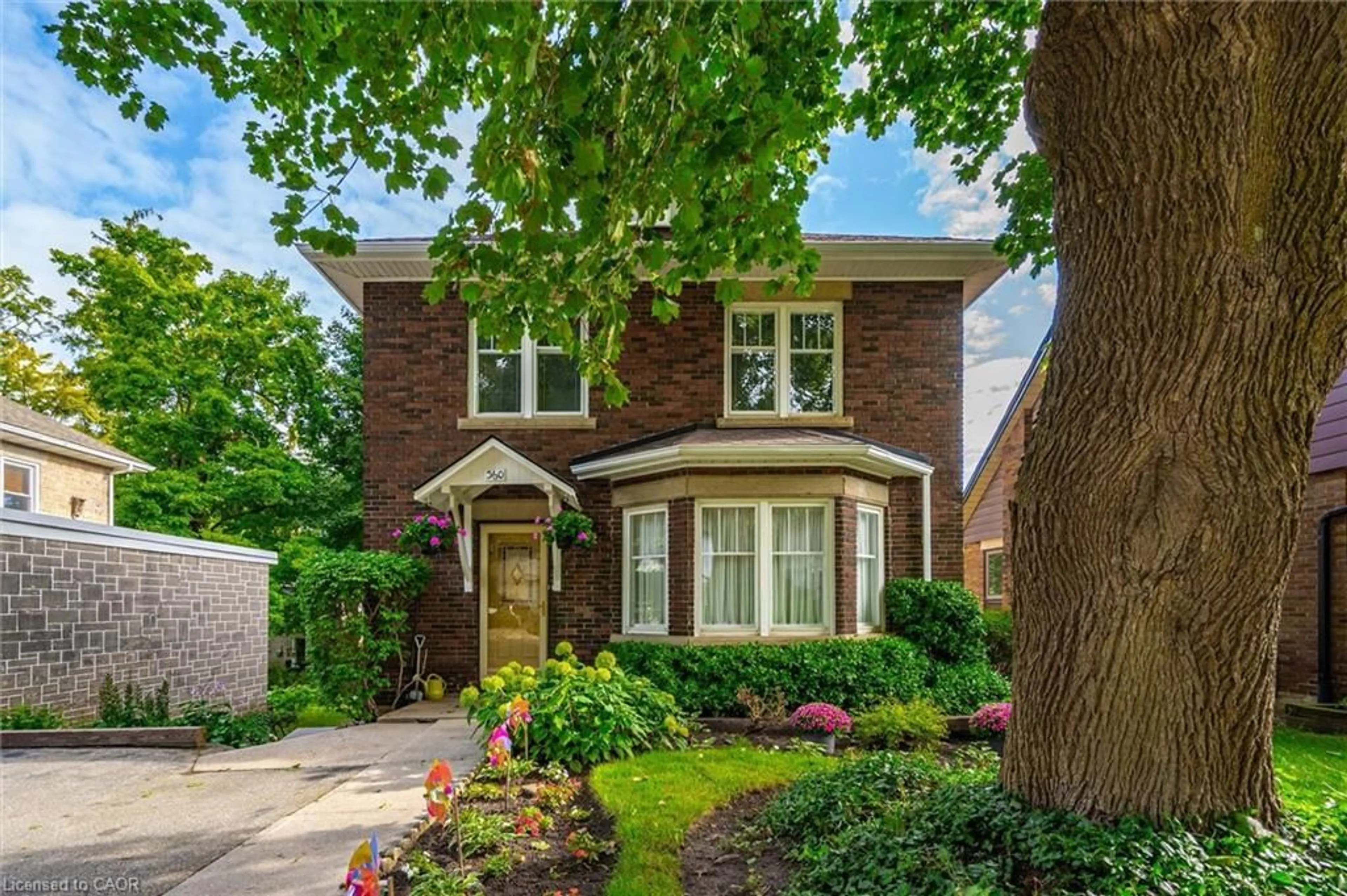 Home with brick exterior material, street for 360 Provost Lane, Fergus Ontario N1M 2N1