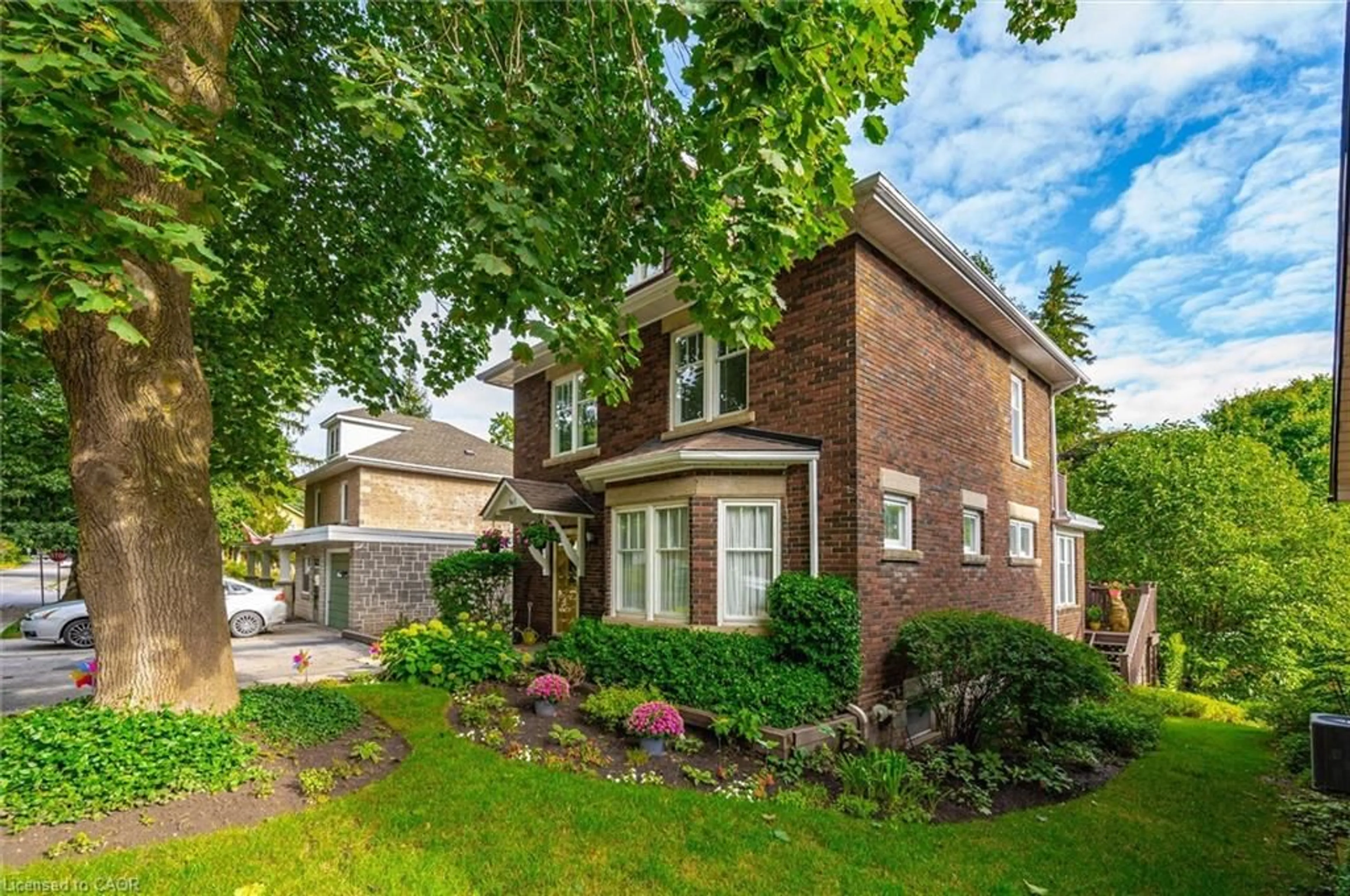 Home with brick exterior material, street for 360 Provost Lane, Fergus Ontario N1M 2N1