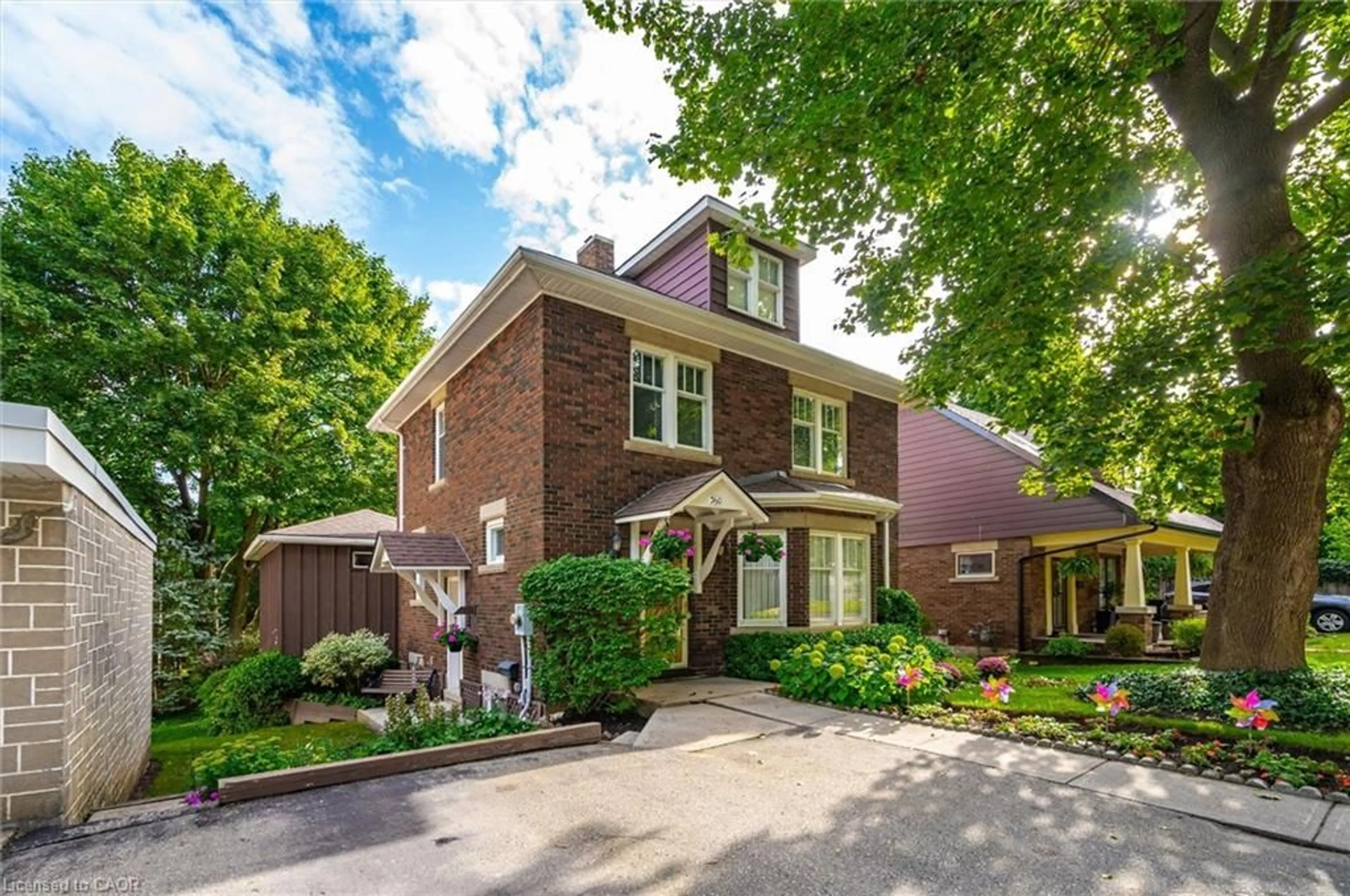 Home with brick exterior material, street for 360 Provost Lane, Fergus Ontario N1M 2N1
