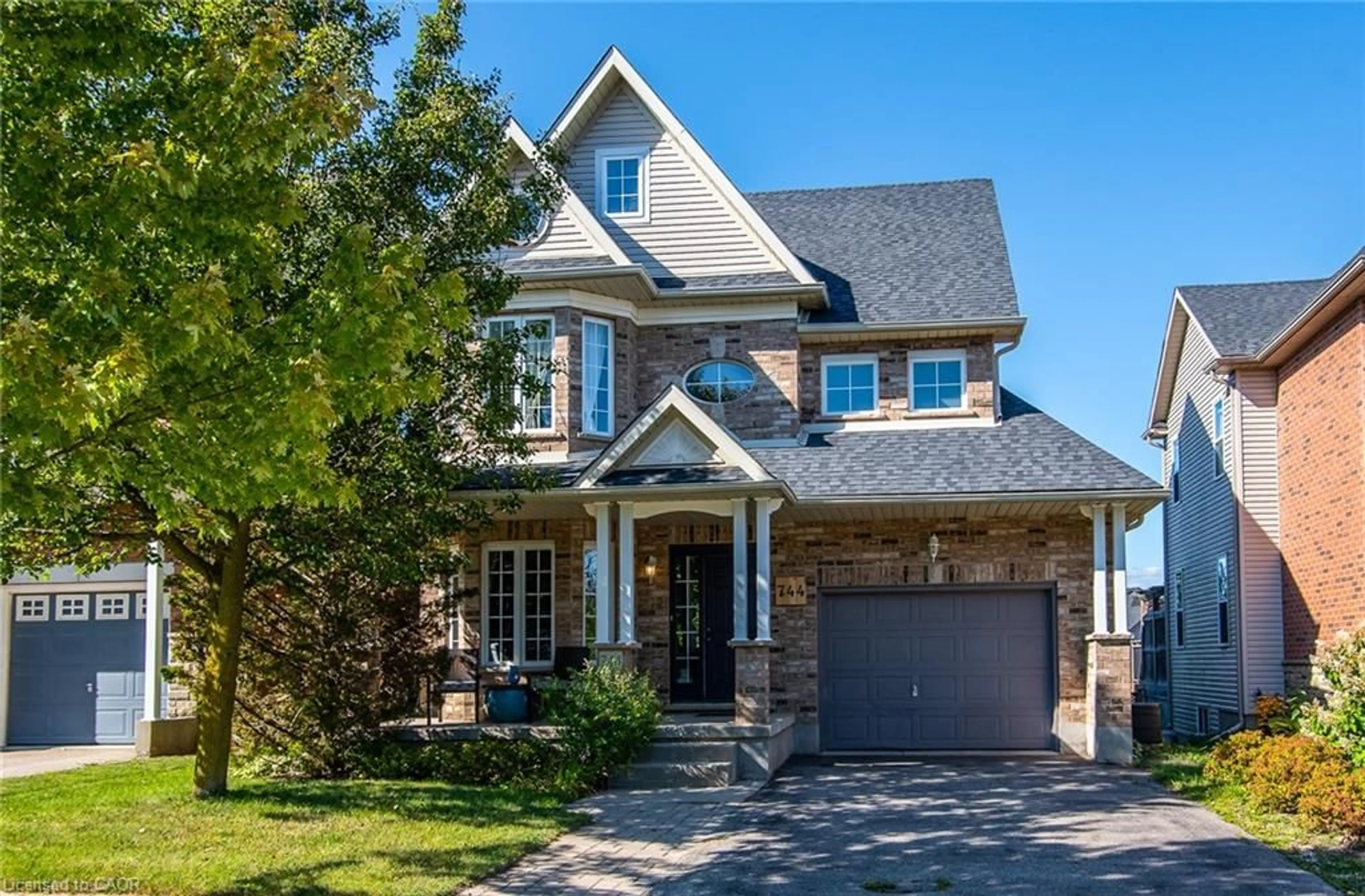 Home with brick exterior material, street for 744 Keats Way, Waterloo Ontario N2T 2Y3