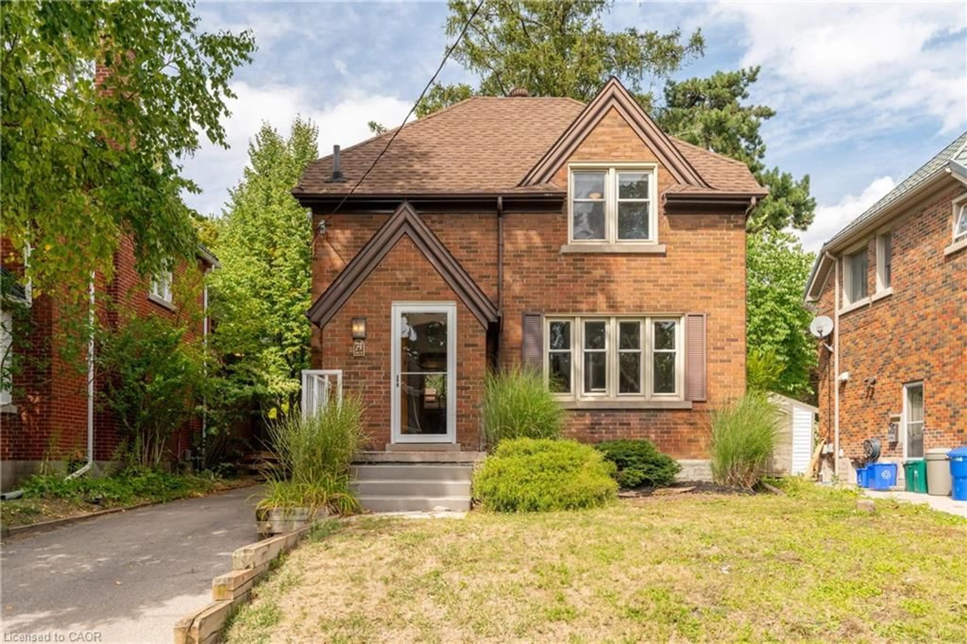 Home with brick exterior material, street for 74 Dane St, Kitchener Ontario N2H 3H7