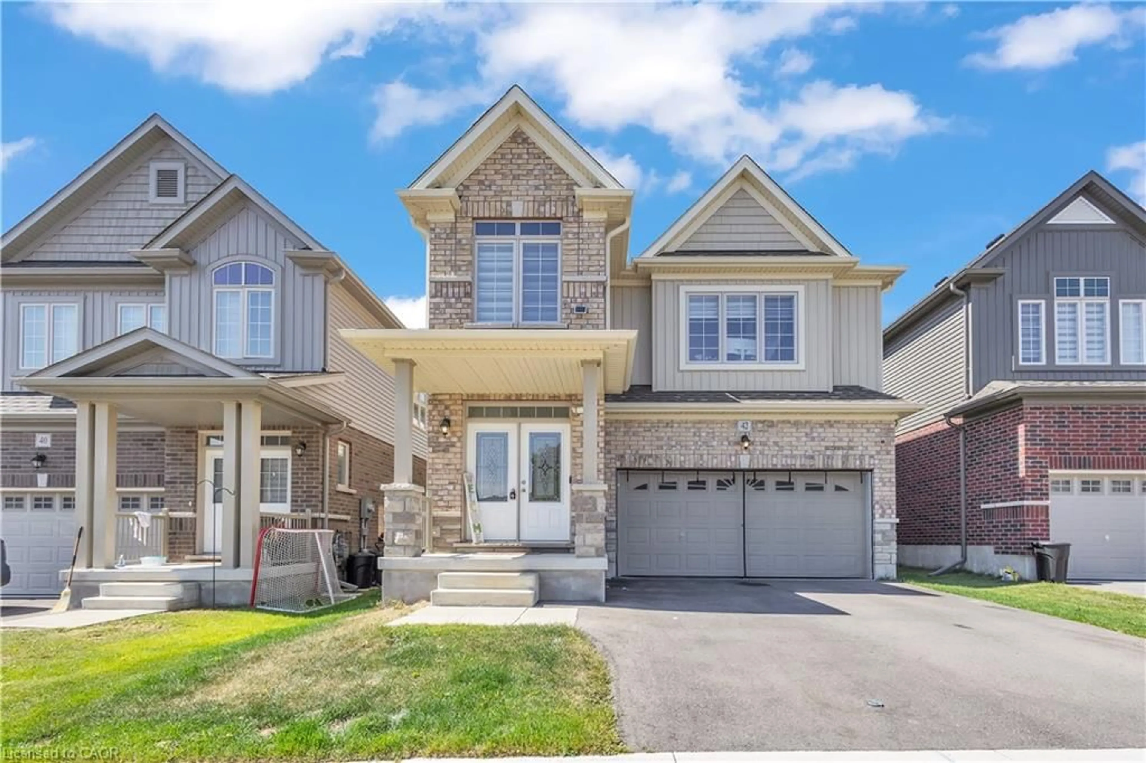 Home with brick exterior material, street for 42 Henry Maracle St, Ayr Ontario N0B 1E0