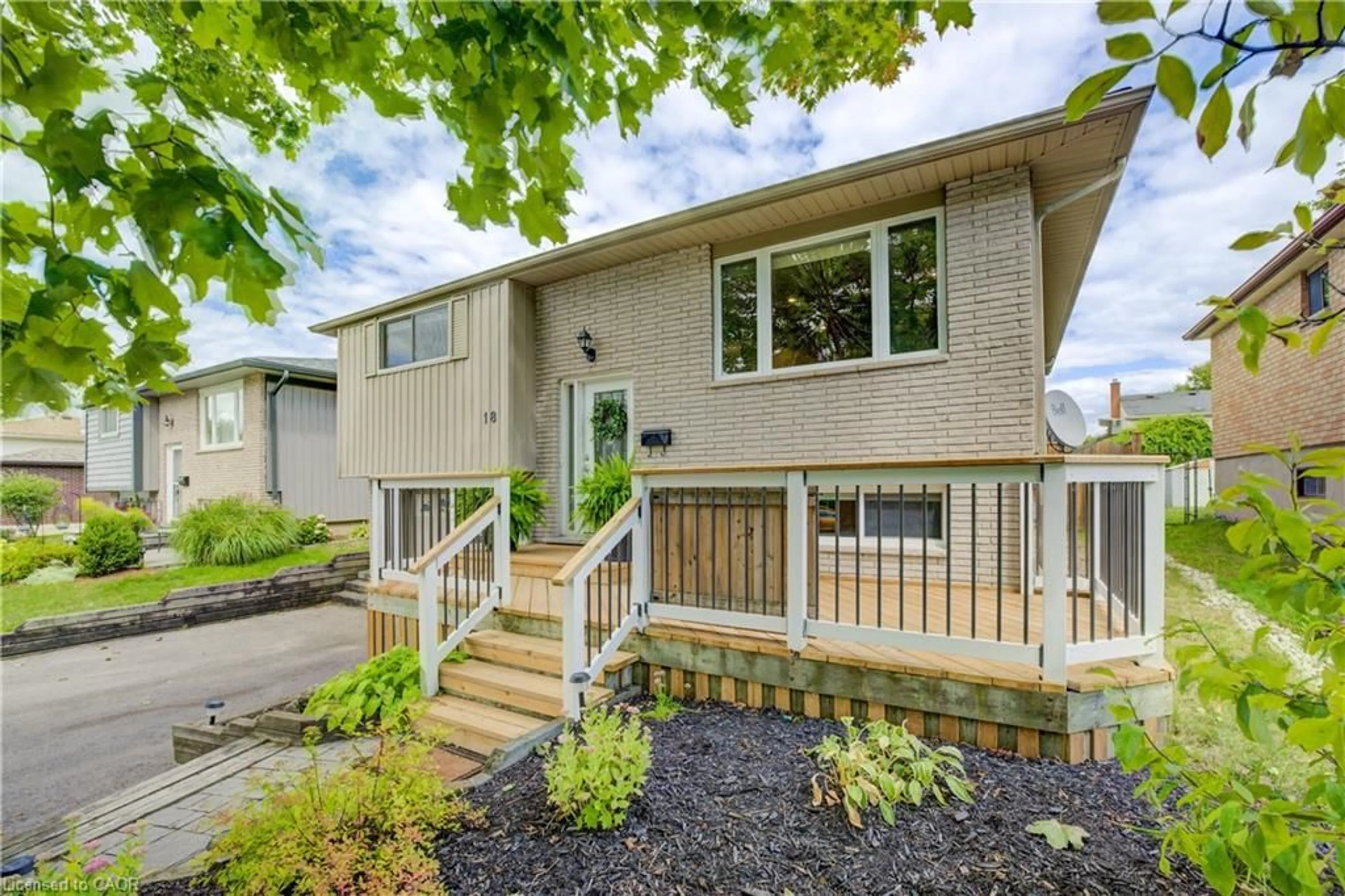 Home with vinyl exterior material, street for 18 Sugar Maple St, Kitchener Ontario N2N 1X5