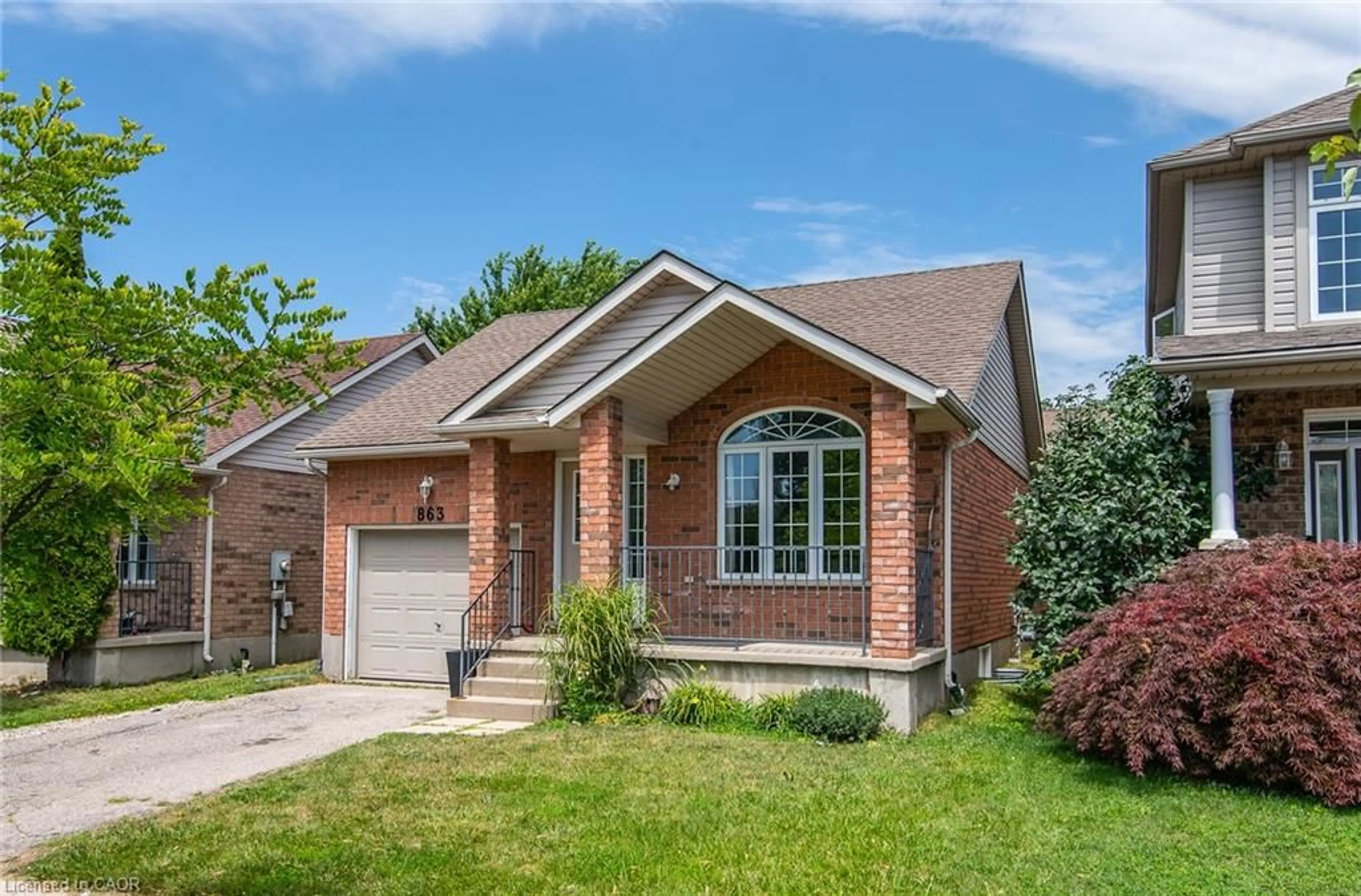 Home with brick exterior material, street for 863 Brandenburg Blvd, Waterloo Ontario N2T 2X6